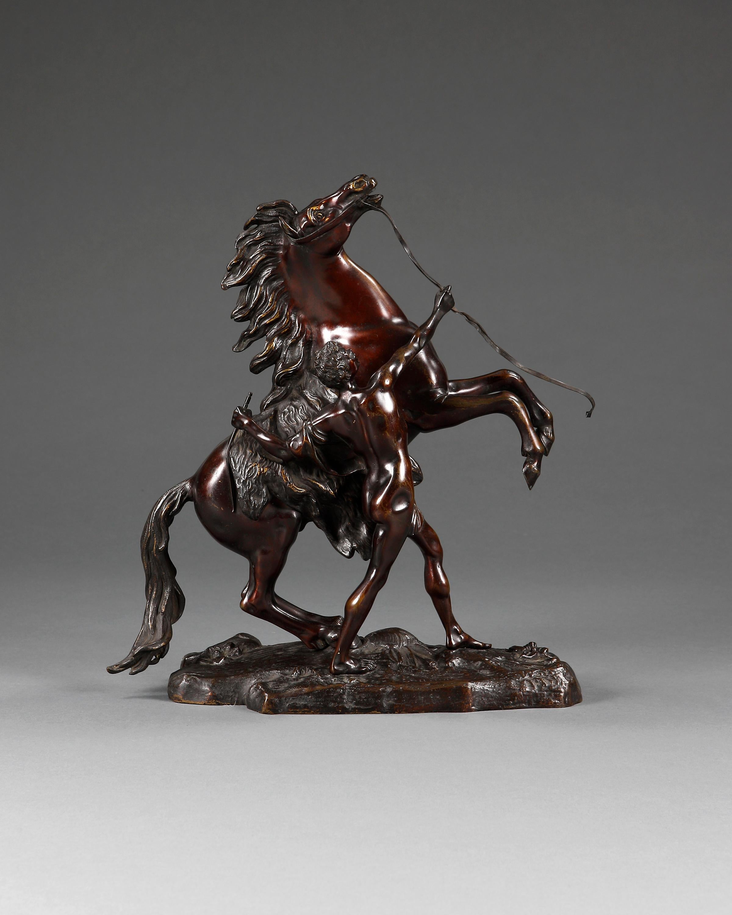 Fine pair of bronzes known as 'horse tamers' or 'horses restrained by grooms'. After the original by Guillaume Coustou the Elder (1677-1746). The original pair were commissioned for Chateau de Marly in 1739 and made in solid marble. This pair now