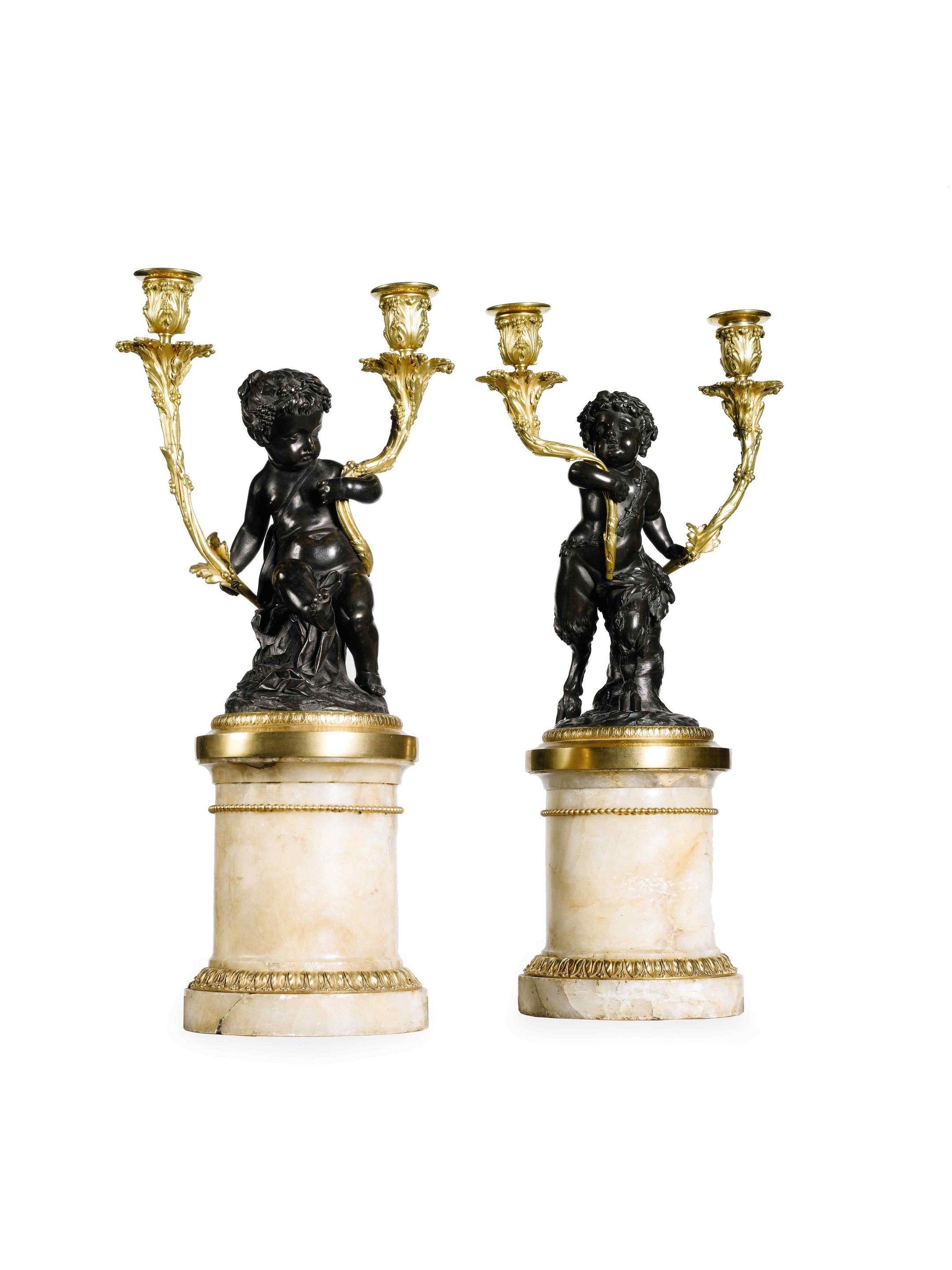 A pair of 19th century bronze, ormolu and fluorspar candelabra.