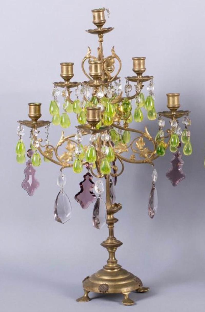 Pair of 19th Century Candelabras with Gilt Metal and Multi-color Crystal Drops
Both have gold gilt metal atop a domed circular base with four splayed feet, with flower head bosses, shaped columnar body and two tiers of scrolling arms hung with