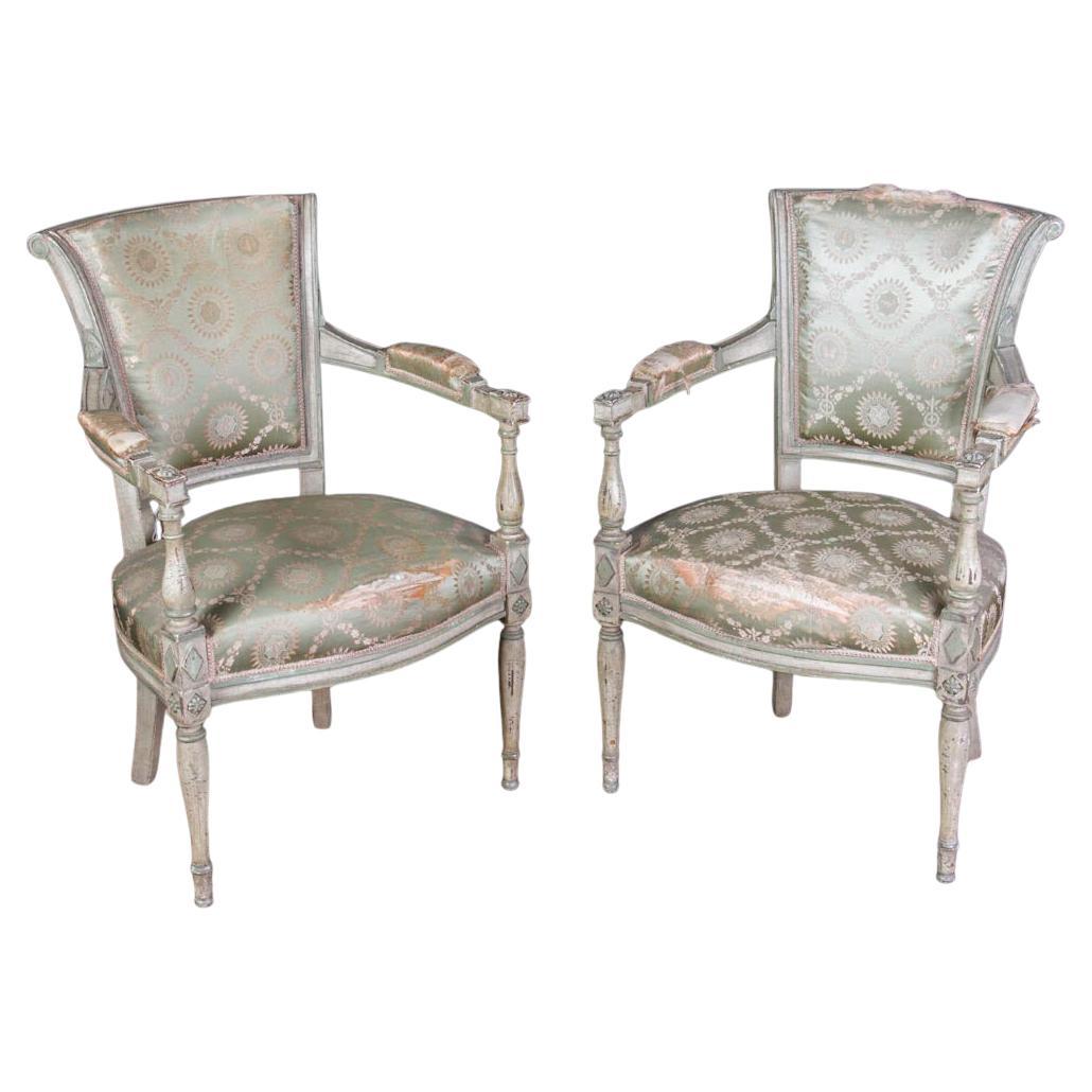Coppia di Fauteuil Directoire intagliati e dipinti del XIX secolo