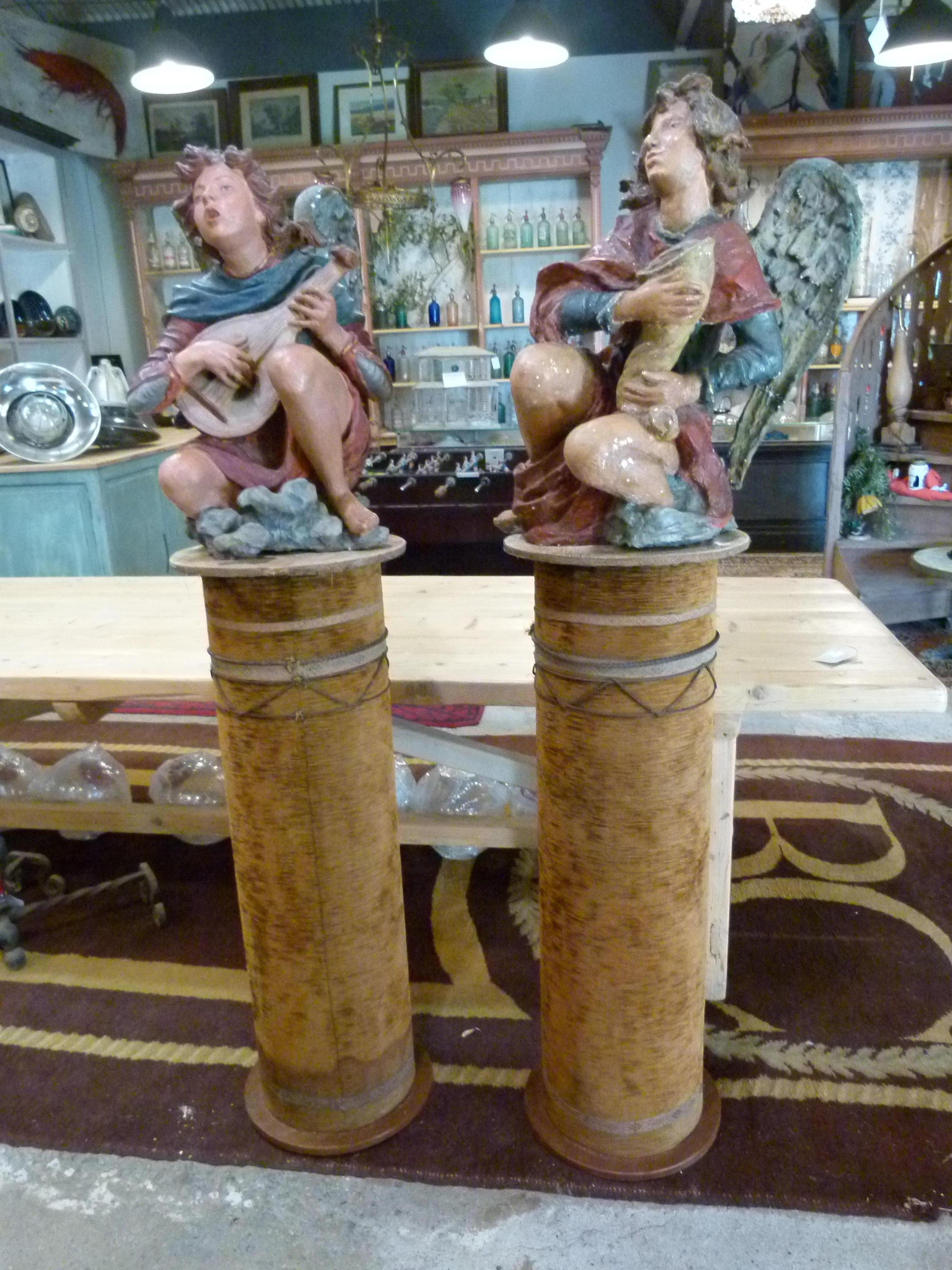 19th Century polychromed terracotta pair of Angels. The pedestals shown in the photos are not included.

Measurements:
Angels figure: 69 cm (23,6 in) height

One of the angel's wings is broken as you can appreciate in one of the photos.