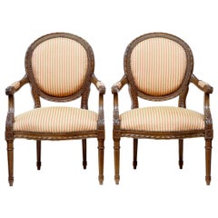 Pair of 19th Century Carved French Walnut Open Armchairs