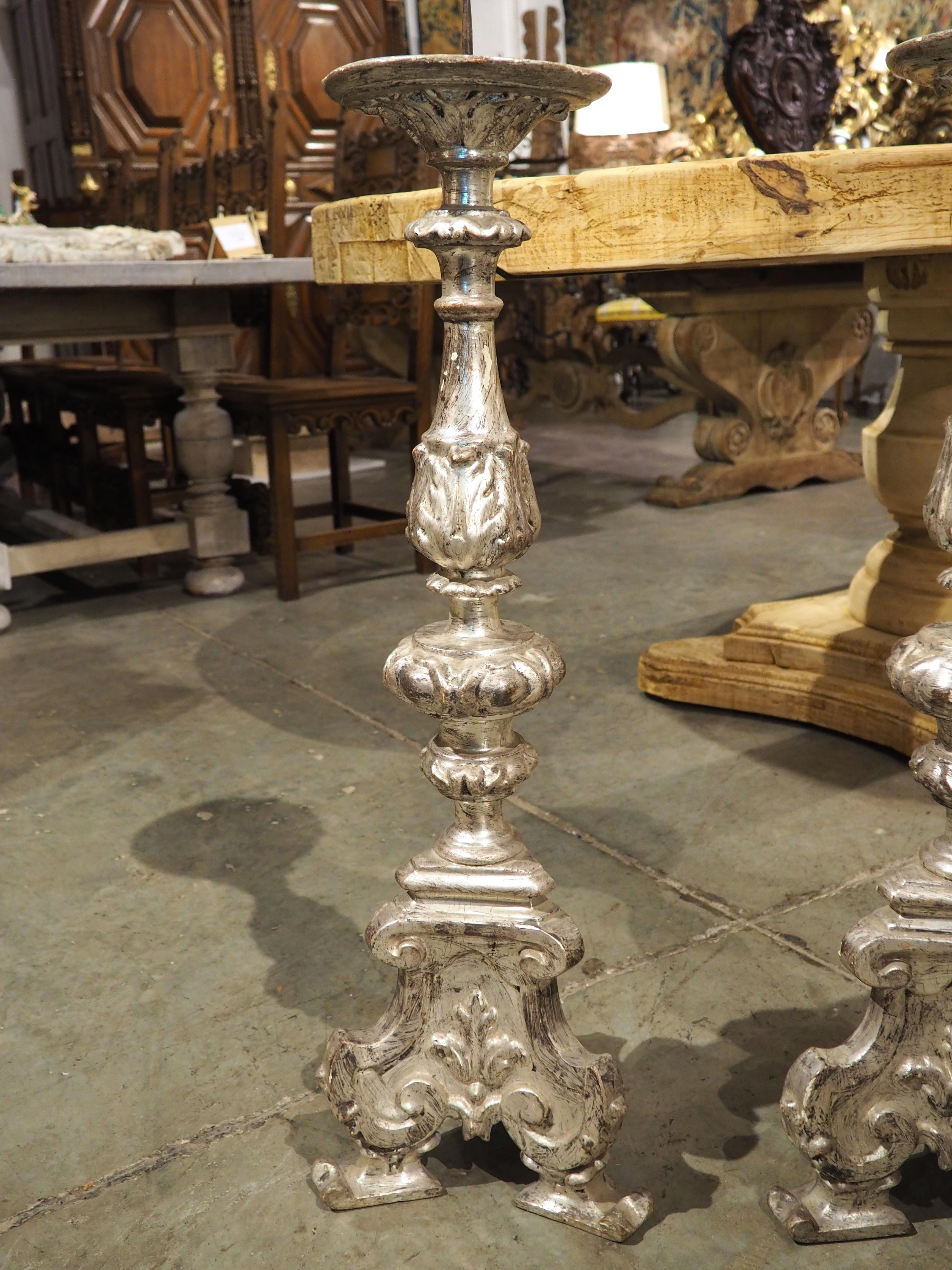 More information coming soon…

Dating to the 1800s, this pair of silverleaf Italian candlesticks have a wonderful balance to the hand-carved motifs.  The tripartite base, which consists of scrolled legs over stylish pad feet, are also adorned with a