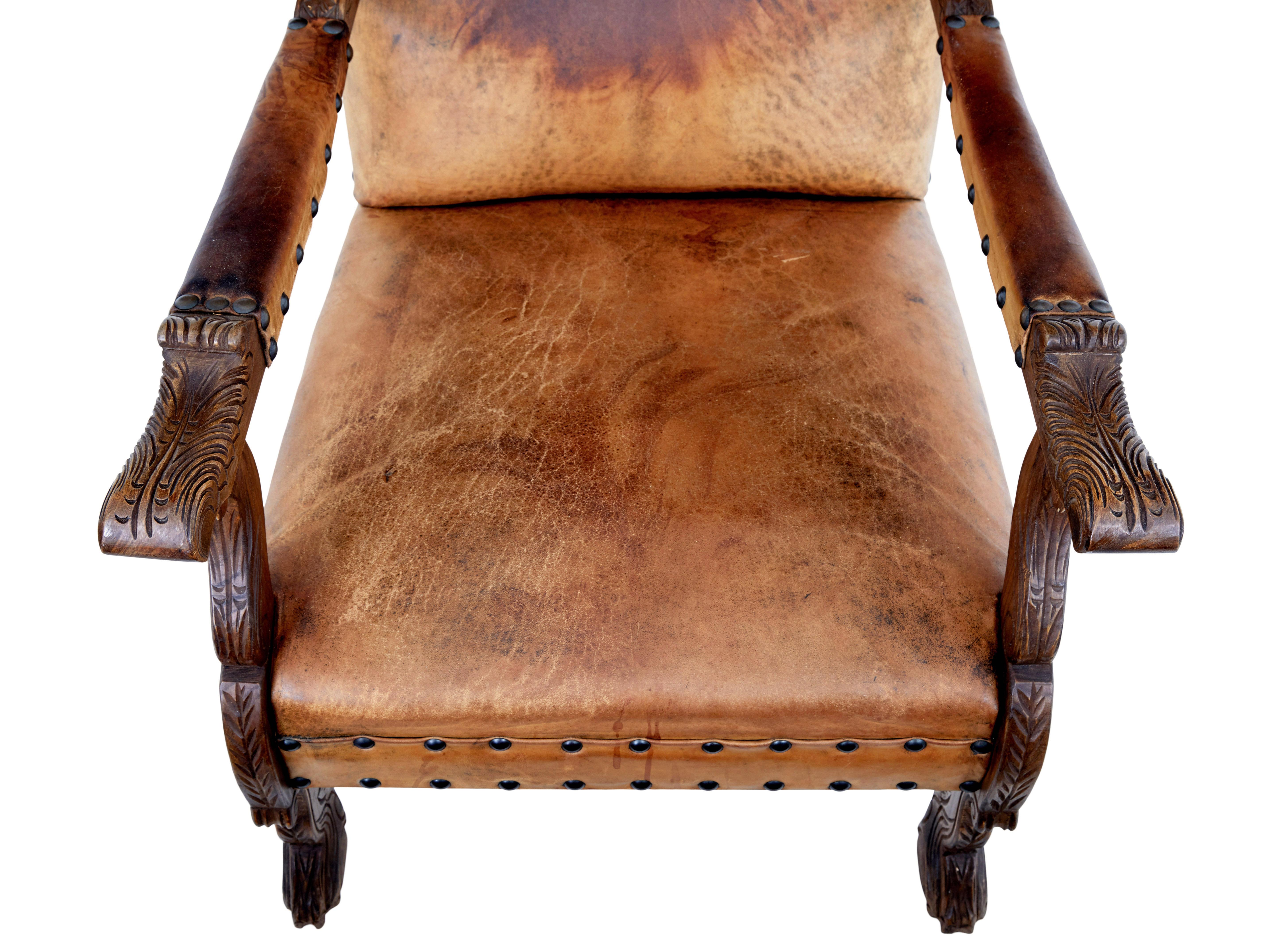 Hand-Carved Pair of 19th century carved oak and leather armchairs For Sale