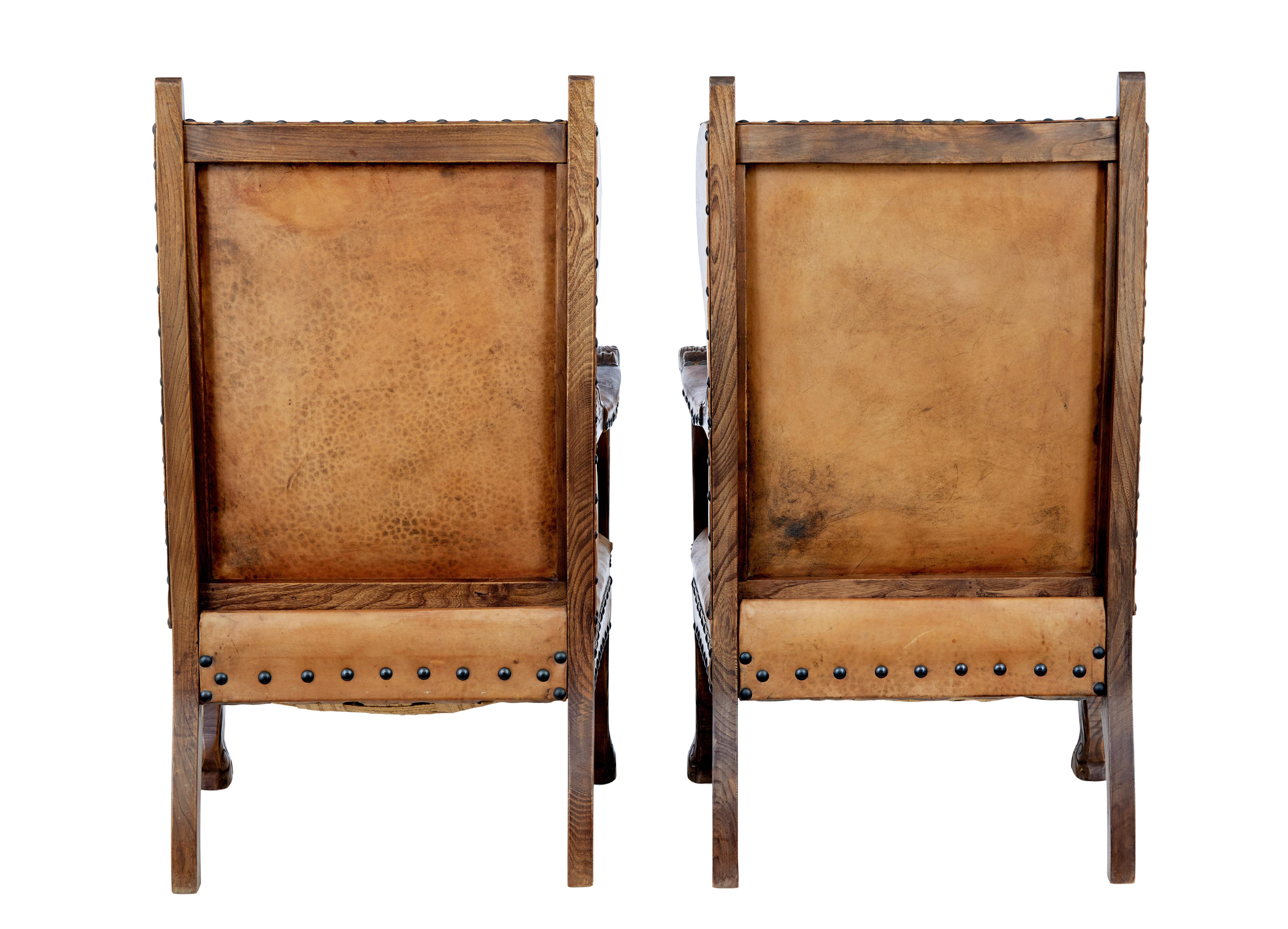 Leather Pair of 19th century carved oak and leather armchairs For Sale