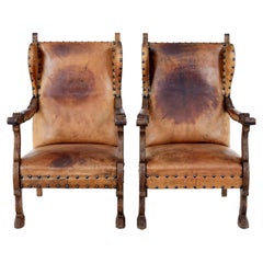 Antique Pair of 19th century carved oak and leather armchairs