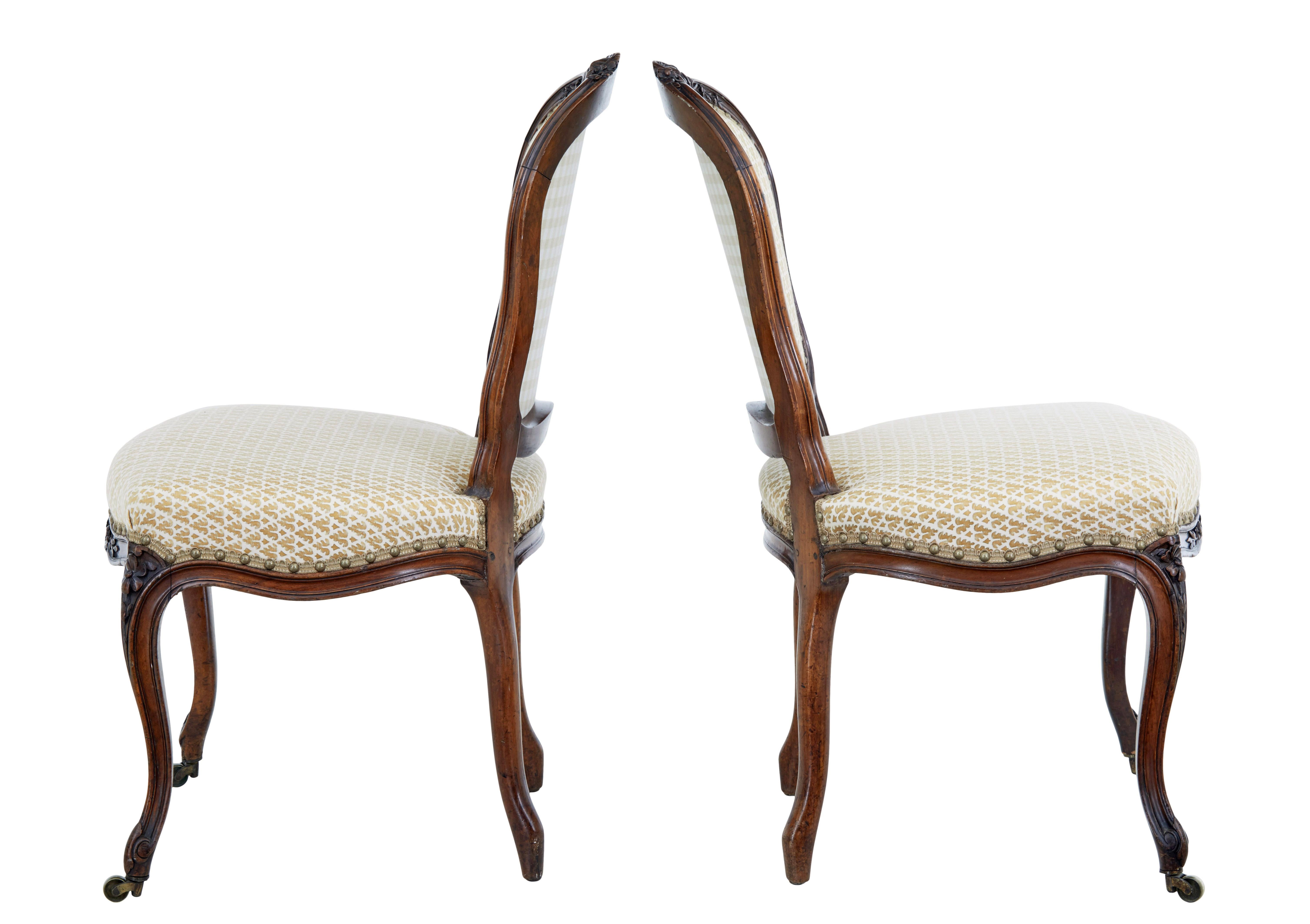 Hand-Carved Pair of 19th Century carved walnut side chairs For Sale