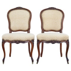 Pair of 19th Century carved walnut side chairs
