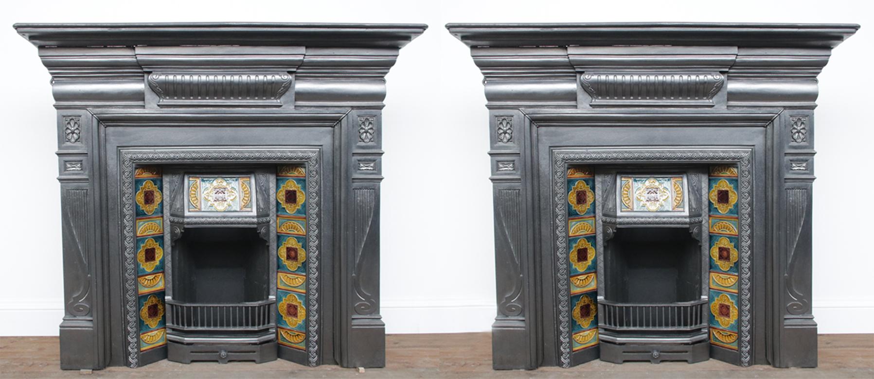Pair of 19th Century Cast Iron Fire Surrounds with Original Tiled Grates