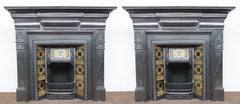 Pair of 19th Century Cast Iron Fire Surrounds with Original Tiled Grates