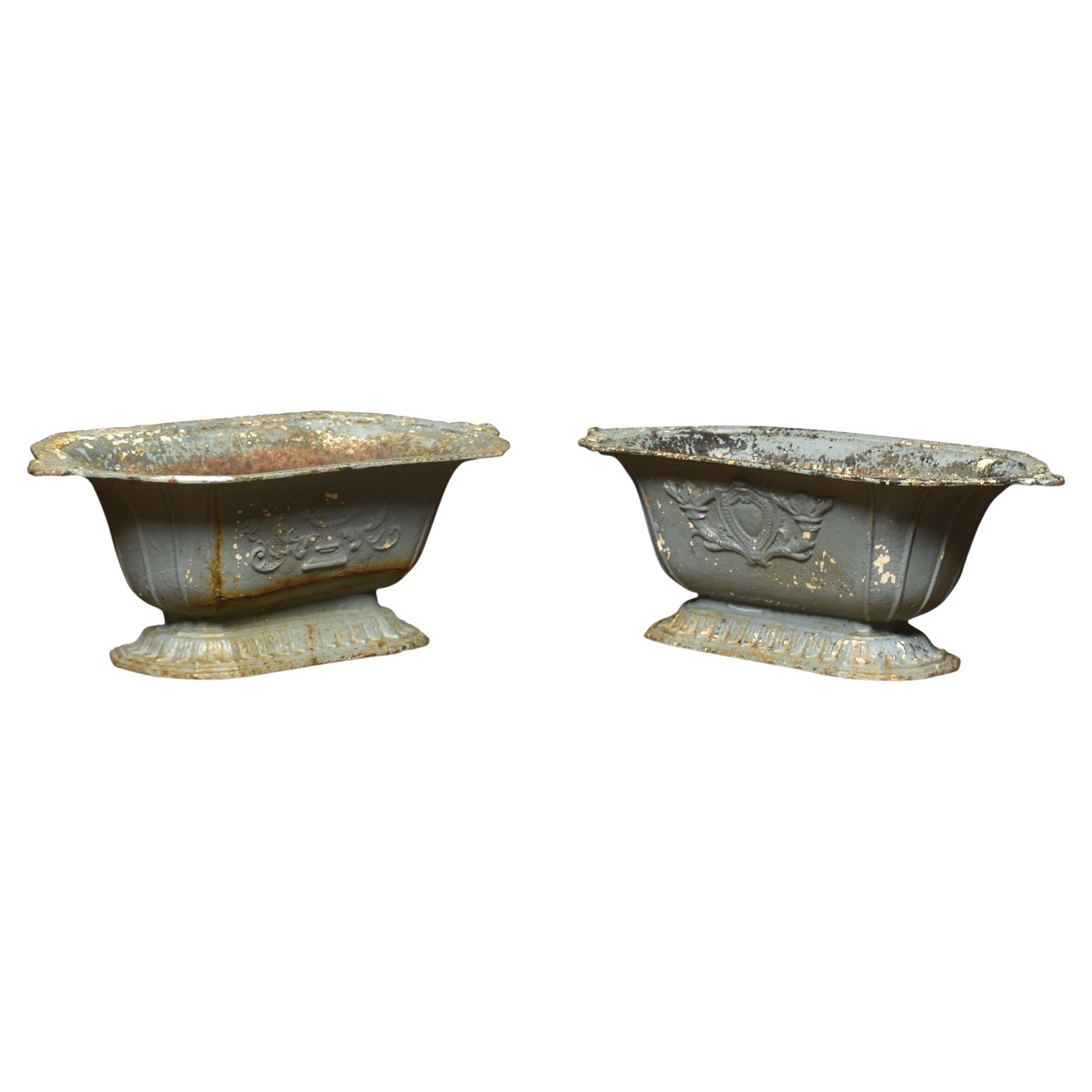Pair of 19th Century Cast Iron Planters For Sale