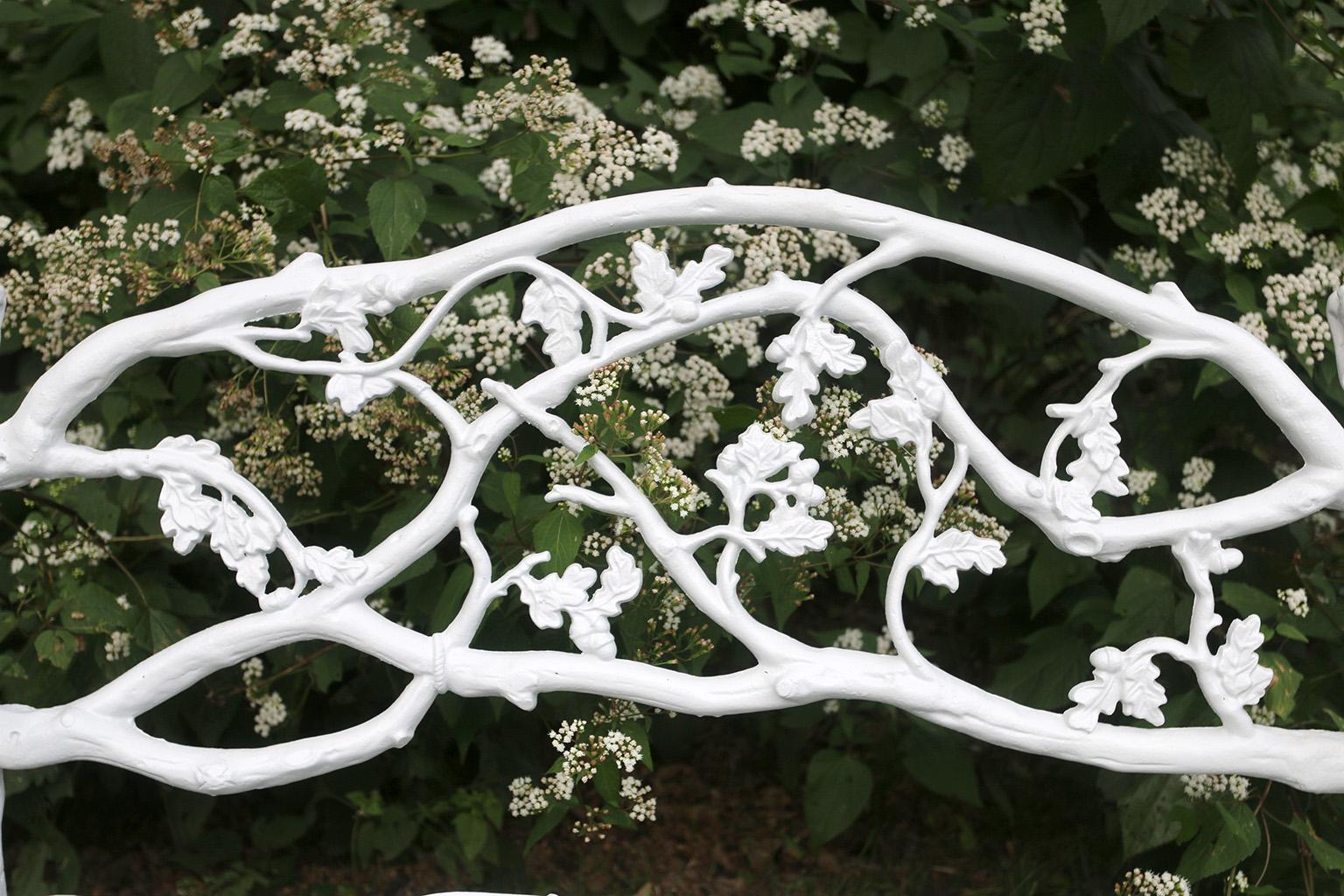 Cast Pair of 19th-century cast-iron twig seats marked by maker For Sale
