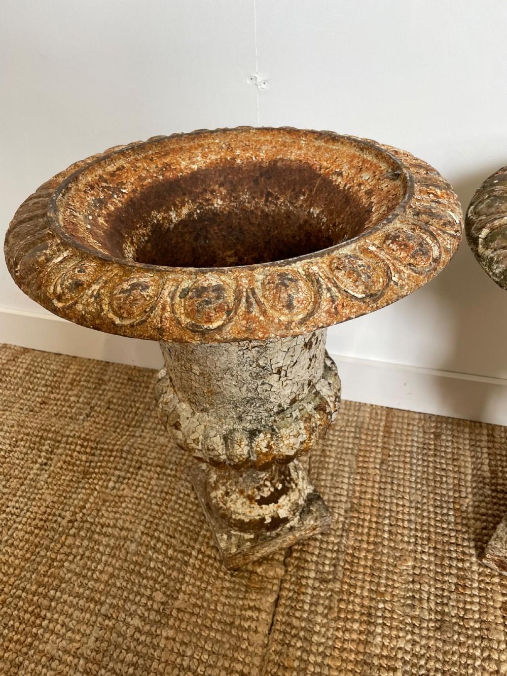 Iron Pair of 19th century cast iron urns  For Sale