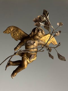 Pair of 19th century cherubs lamps