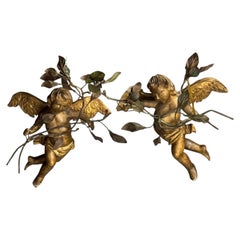 Pair of 19th century cherubs lamps