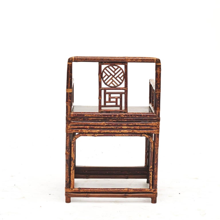 Pair of Chinese bamboo arm chairs with plain flat linden wood seat (linden wood is also called lime tree).
Black and burgundy lacquer with beautiful natural age-related patina highlighted by a new clear lacquer finish.
Original condition. China