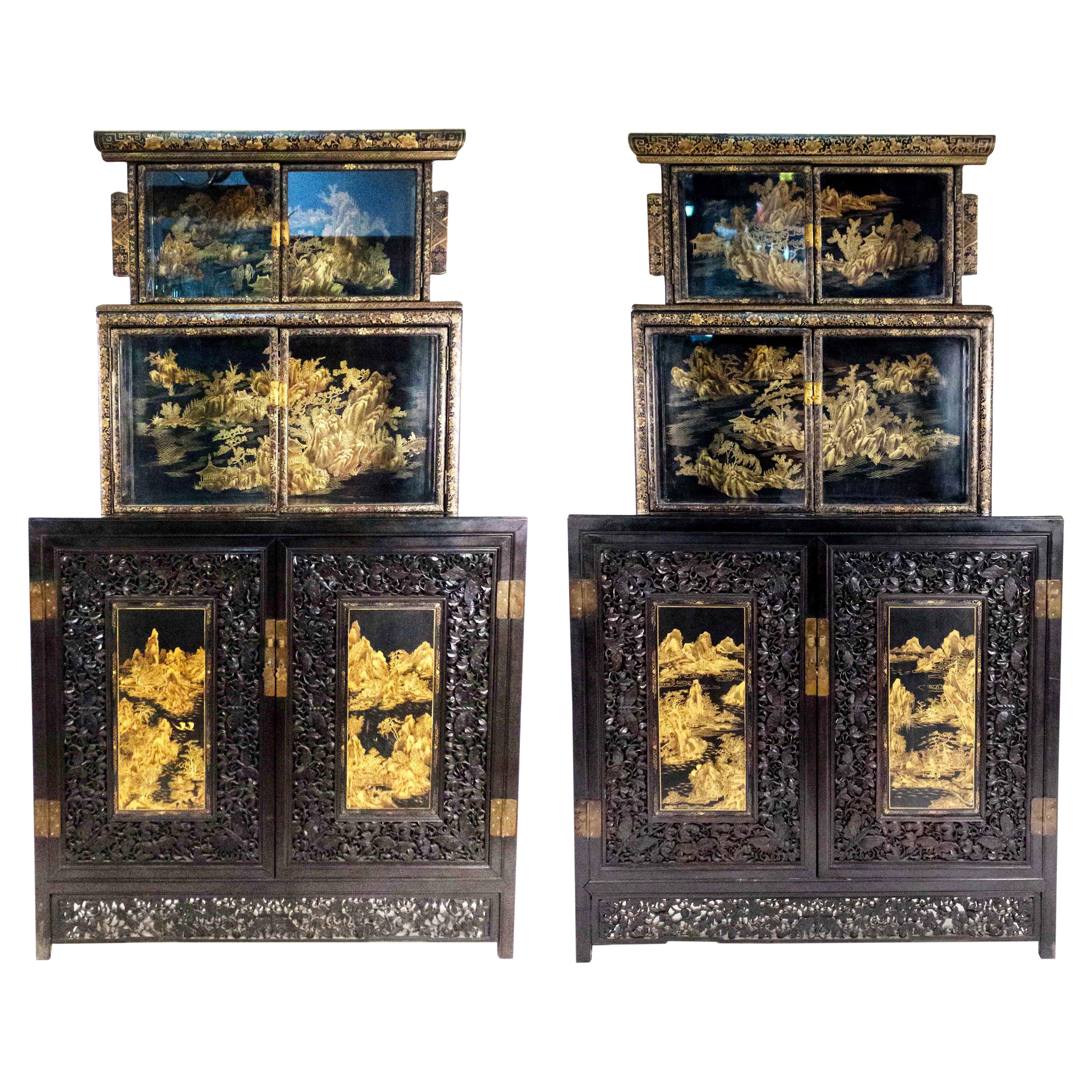 Pair of 20th Century Chinese Black and Gold Lacquered Three-Tiered Cabinets