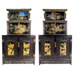 Antique Pair of 20th Century Chinese Black and Gold Lacquered Three-Tiered Cabinets