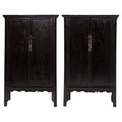 Pair of Chinese Black Lacquer Cabinets with Scalloped Aprons, c. 1800