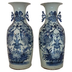 Pair of 19th Century Chinese Blue and White Urn Form Vases with Florals