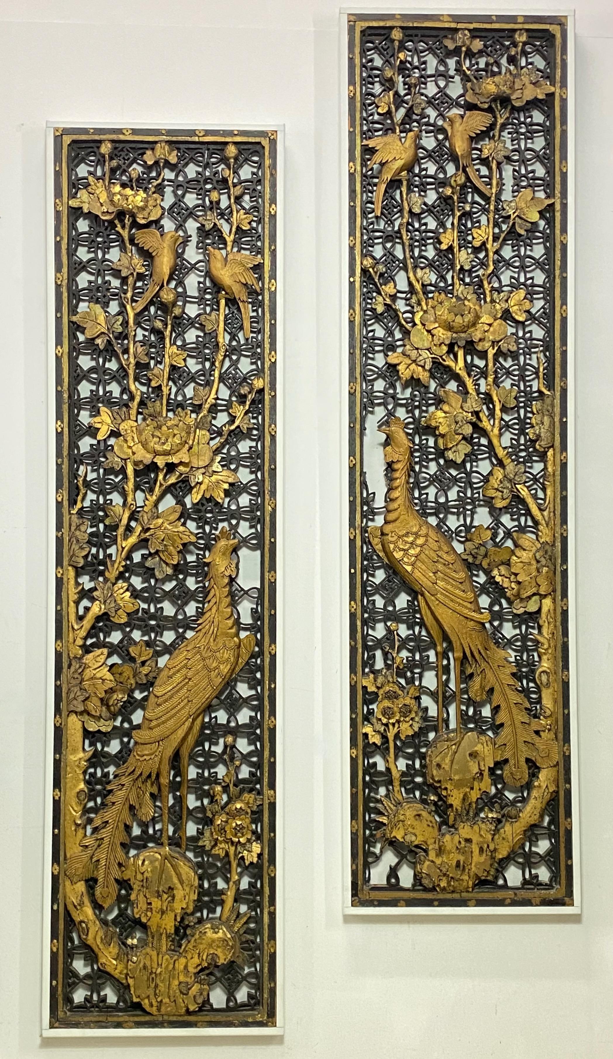 A lovely decorative pair of Chinese architectural open lattice work carved and gilt wall panels. In original antique condition with original paint, having some expected minor losses.
Mid to late 19th century.