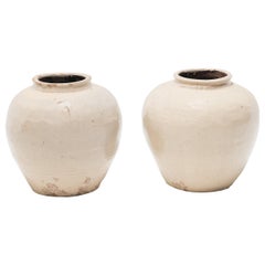 Pair of 19th Century Chinese Crème Faceted Vessels