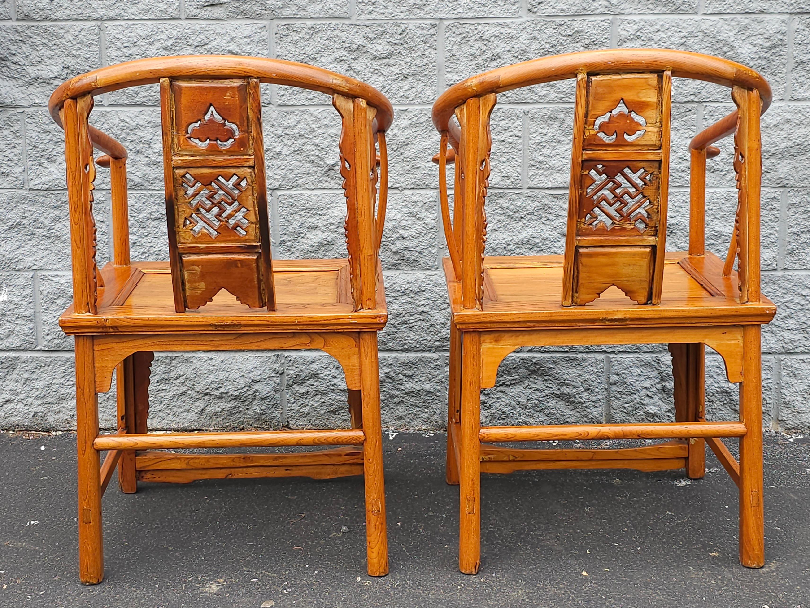 Pair of 19th Century Qing Elmwood Horseshoe-Back Armchairs In Good Condition For Sale In Germantown, MD