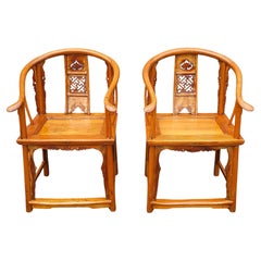 Pair of 19th Century Chinese Elmwood Horseshoe-Back Armchairs
