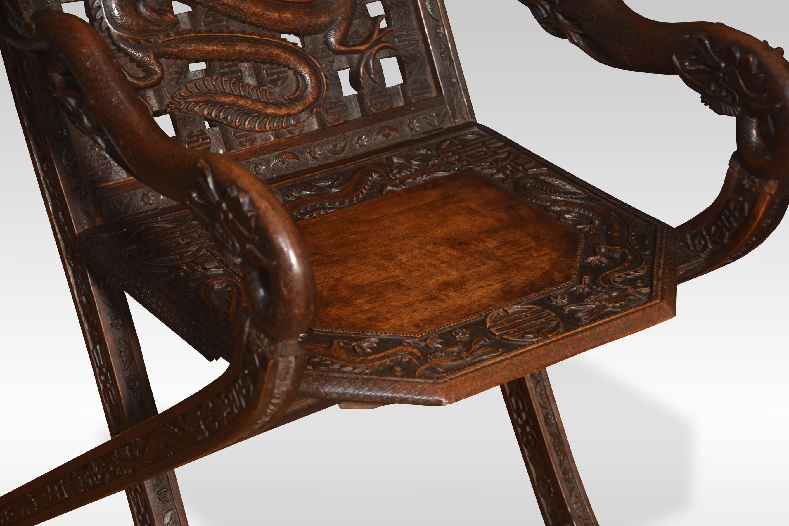 Wood Pair of 19th century Chinese folding armchairs For Sale