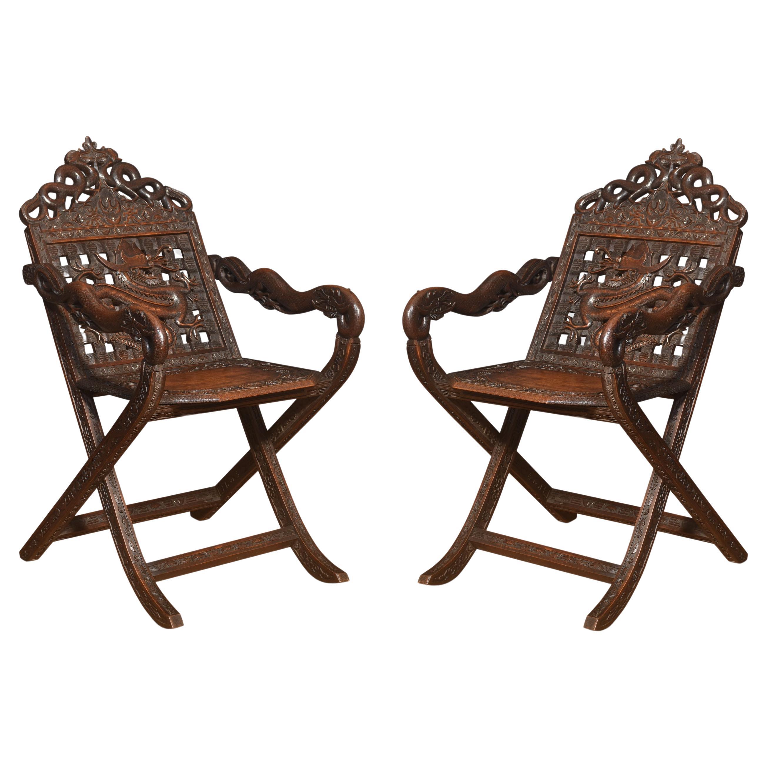 Pair of 19th century Chinese folding armchairs