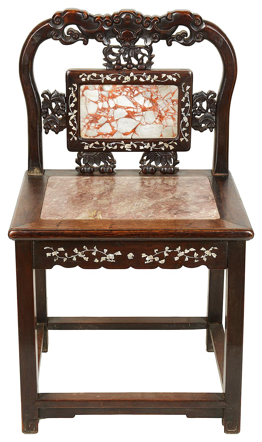 A good quality pair of 19th century Chinese hardwood side chairs, each with inlaid mother-of-pearl, carved bats above cherries and leaves with an inset marble to the back and seats. Raised on square section legs, united by stretchers.