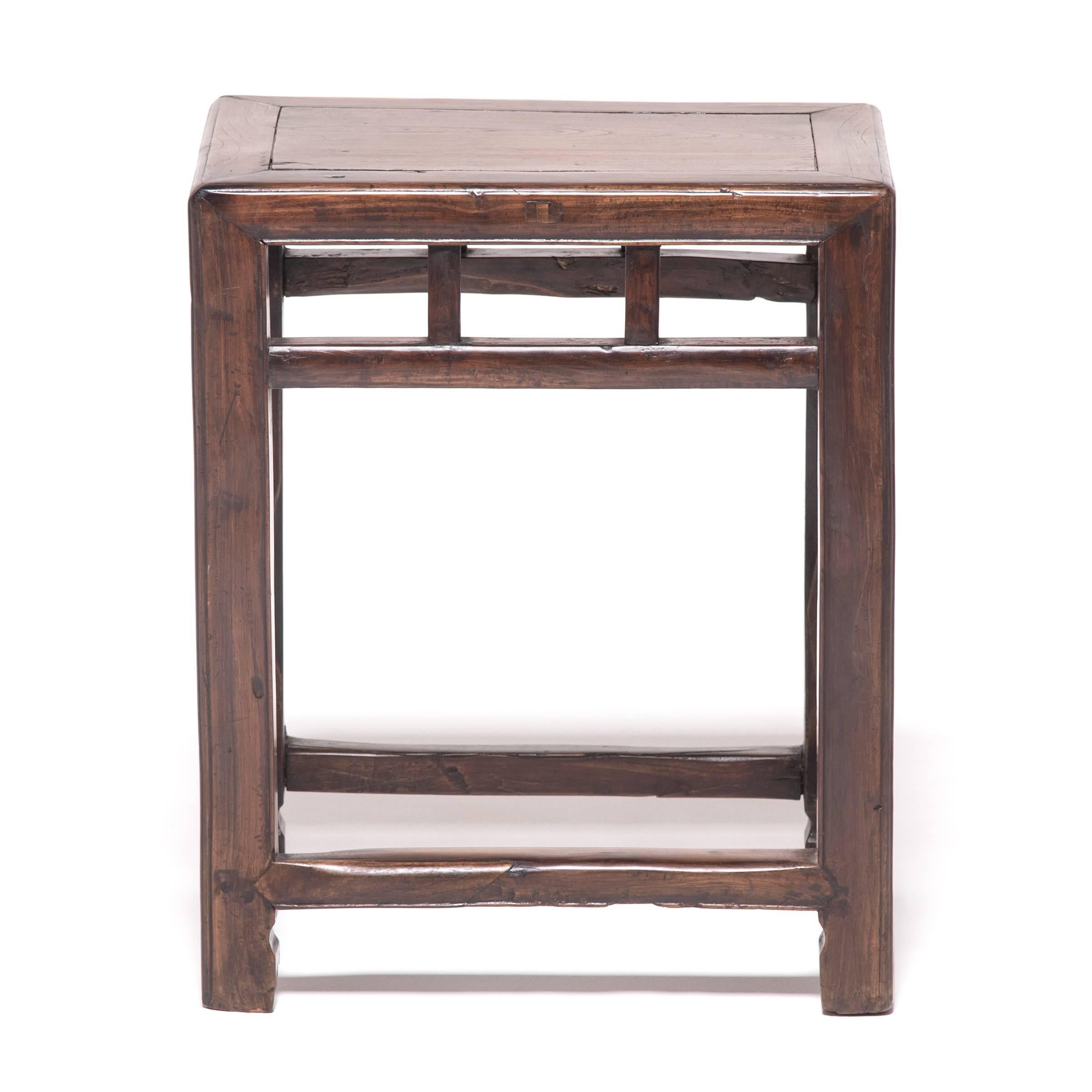Pushed together, this pair of rectangular stools forms a square, hence the name “half stools.” Crafted of jia zhen and beech wood and finished with many coats of hand-applied lacquer, these stools are elegantly appointed with hoof feet and refined