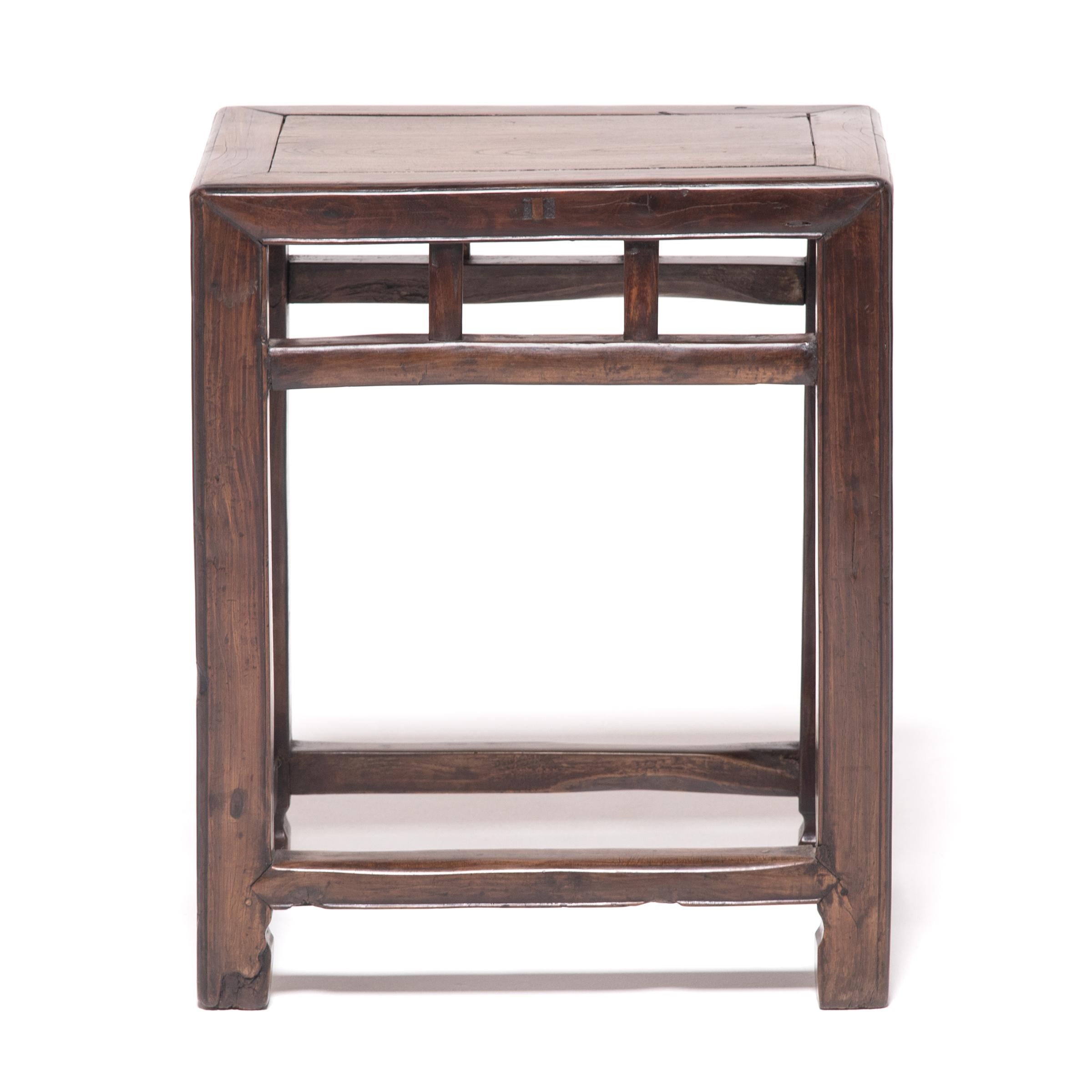 Pushed together, this pair of rectangular stools forms a square, hence the name “half stools.” Crafted of Jia Zhen and beech wood and finished with many coats of hand-applied lacquer, the stools are elegantly appointed with hoof feet and refined