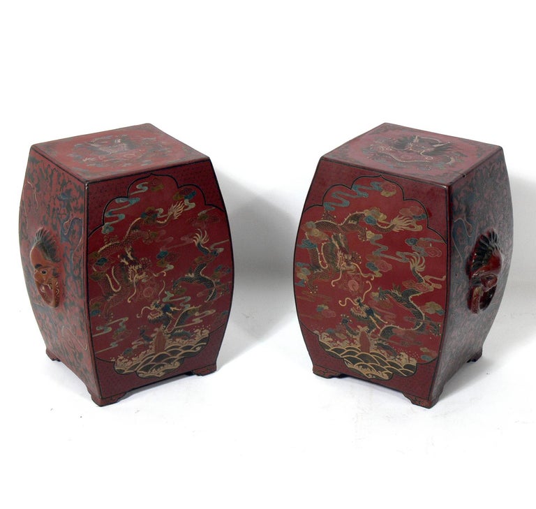 Pair of 19th century Chinese lacquered garden stools or end tables, China, circa 19th century. Outstanding craftsmanship to the hand carved, painted and lacquer finish. They were purchased in London in the 1980s by Zane Moss Antiques.
