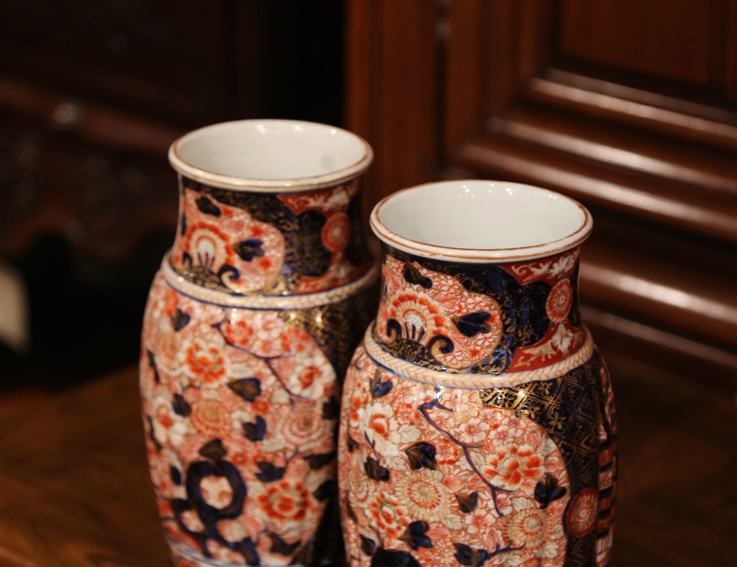 Hand-Painted Pair of 19th Century Japanese Porcelain Imari Vases with Floral Decor