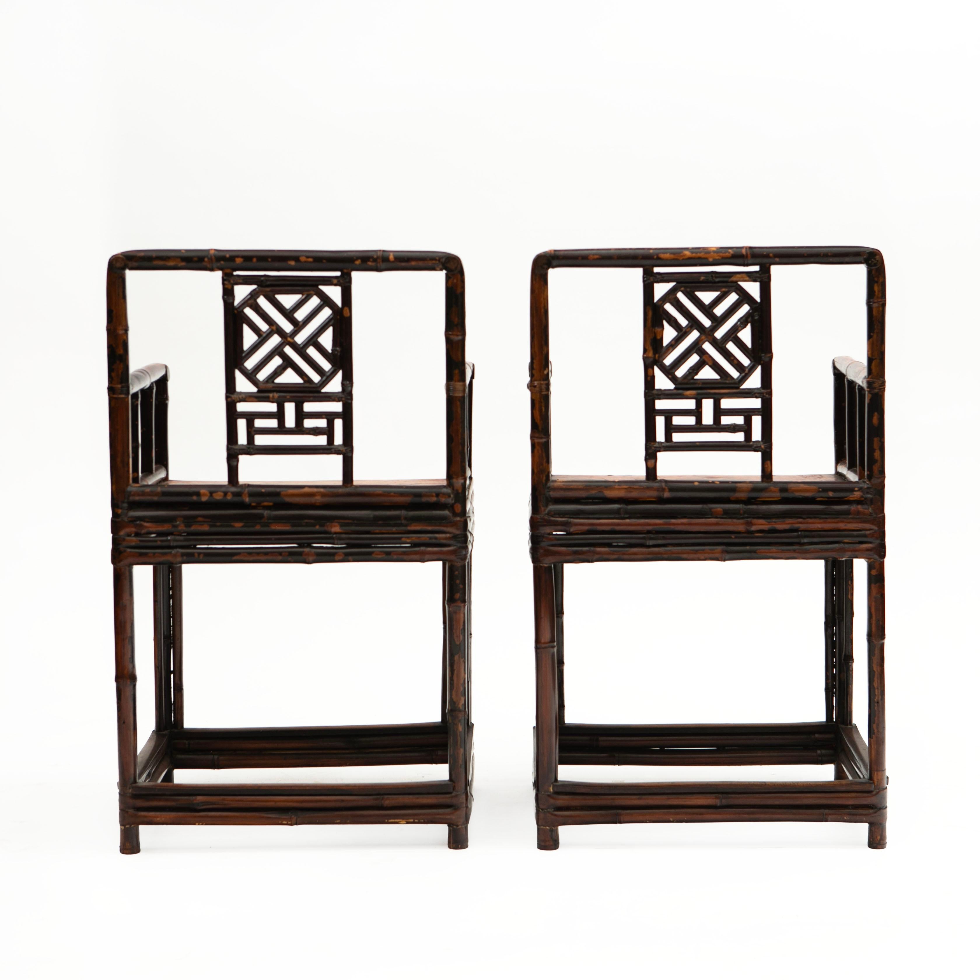 Lacquered Pair of 19th Century Chinese Qing Period Bamboo Arm Chairs with Burgundy Lacquer For Sale