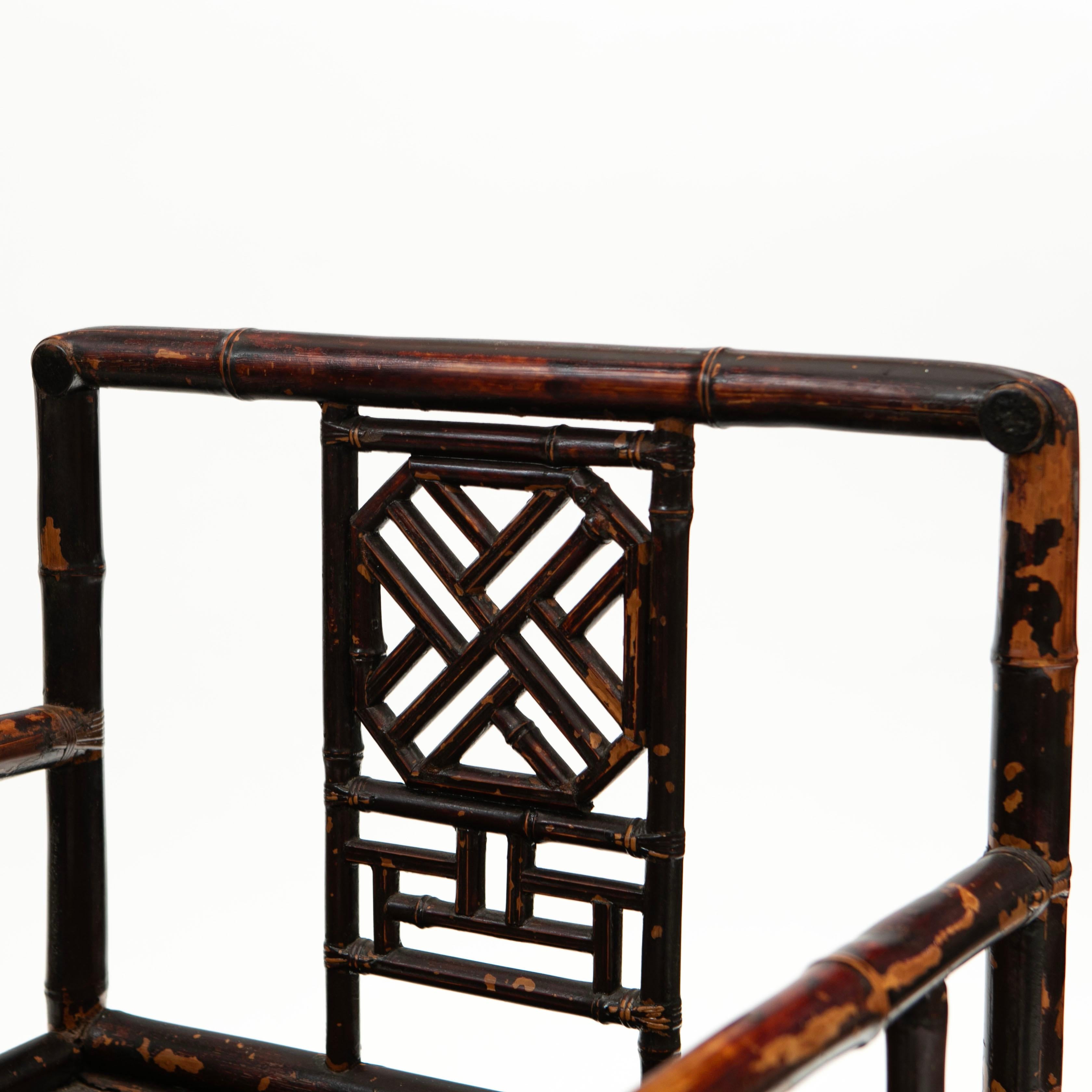 Pair of 19th Century Chinese Qing Period Bamboo Arm Chairs with Burgundy Lacquer For Sale 3