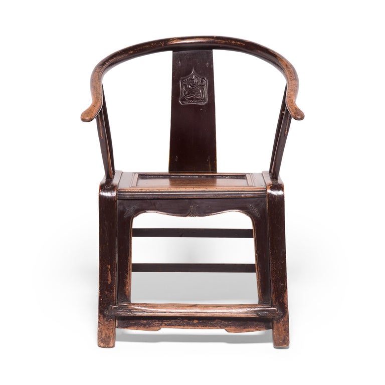 For these elegant 19th-century elmwood chairs, the devil—or deer, as it were, is in the details. Masterful mortise and tenon joinery defines the chairs' seamless end-to-end construction, and their round backs were achieved through a centuries old