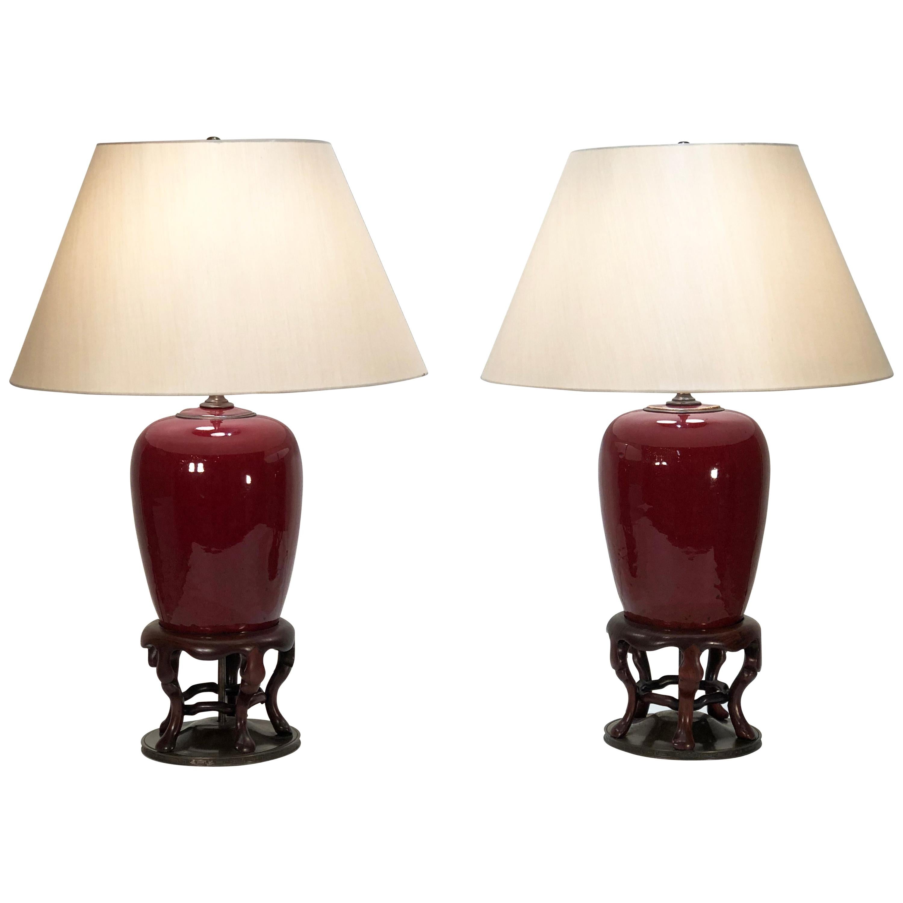Pair of 19th Century Chinese Sang De Boeuf Porcelain Lamps