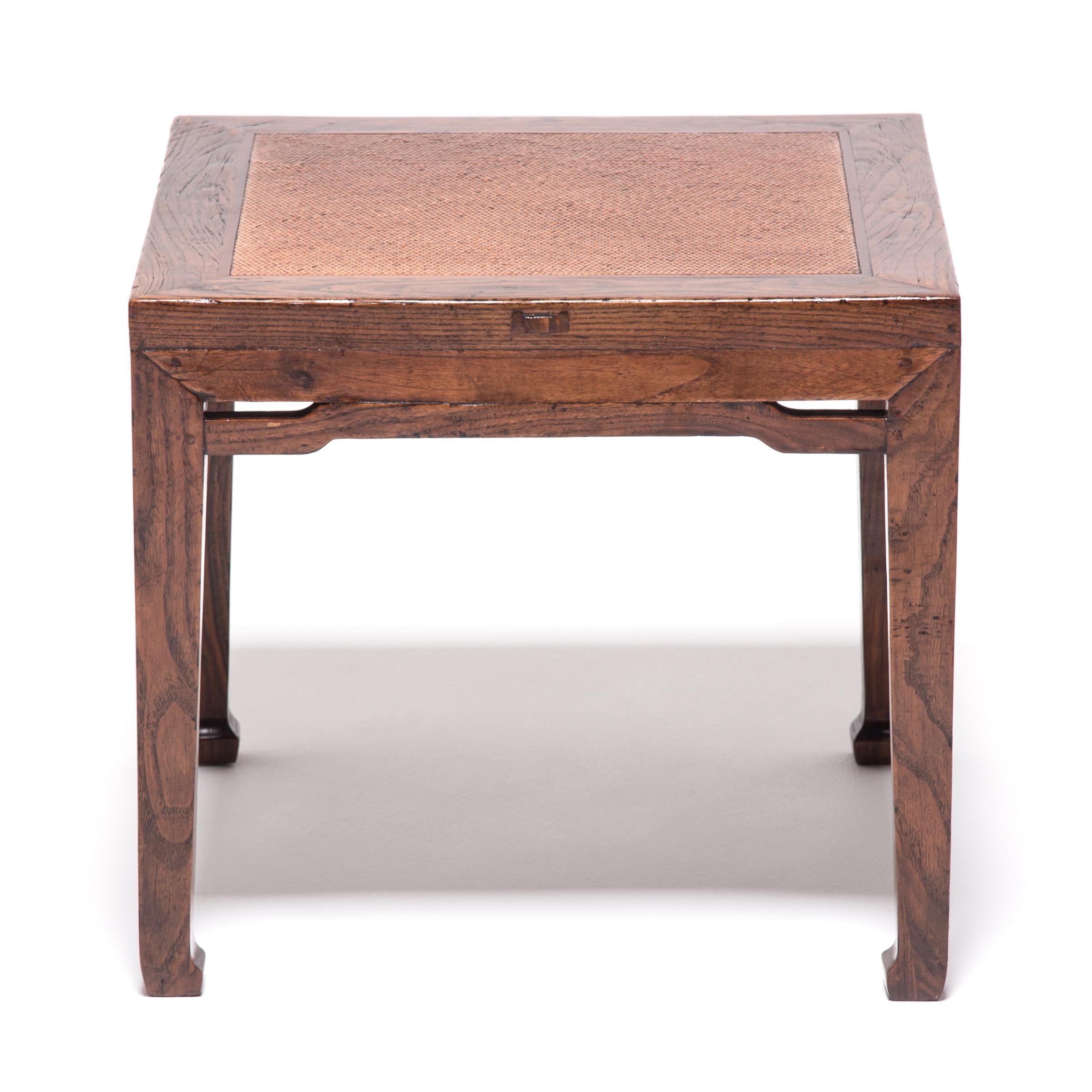 Although a common item in homes of all means, the relatively high stature of these 19th century stools indicates the original owner was of equally high standing. Made of richly grained elmwood, the stools have a refined design with subtle hoof feet