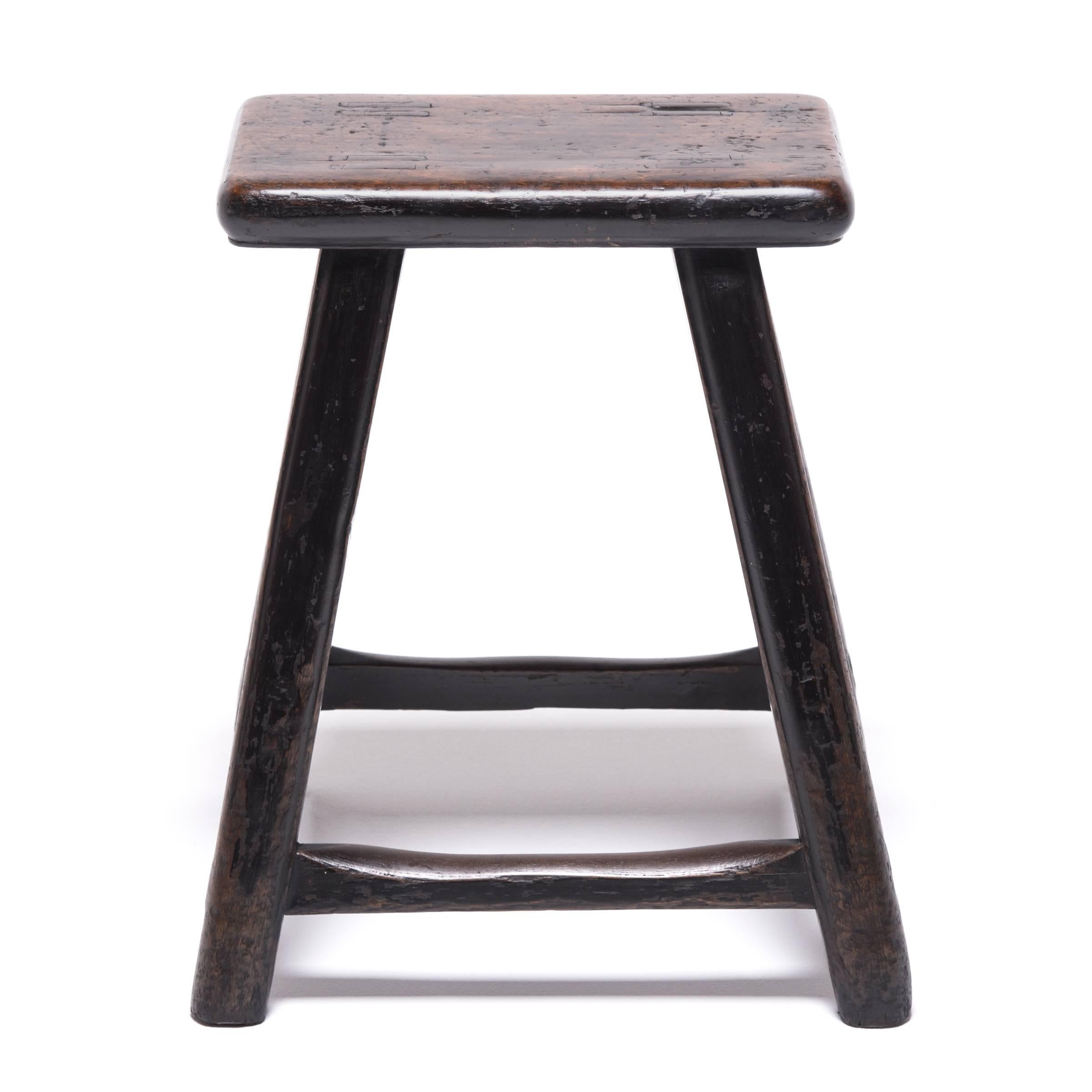 More portable than chairs, stools were a versatile seating option for scholars, business people, and peasants alike. The tapered stance on this pair of stools from Shanxi province shows us how masterfully 19th century carpenters married form and