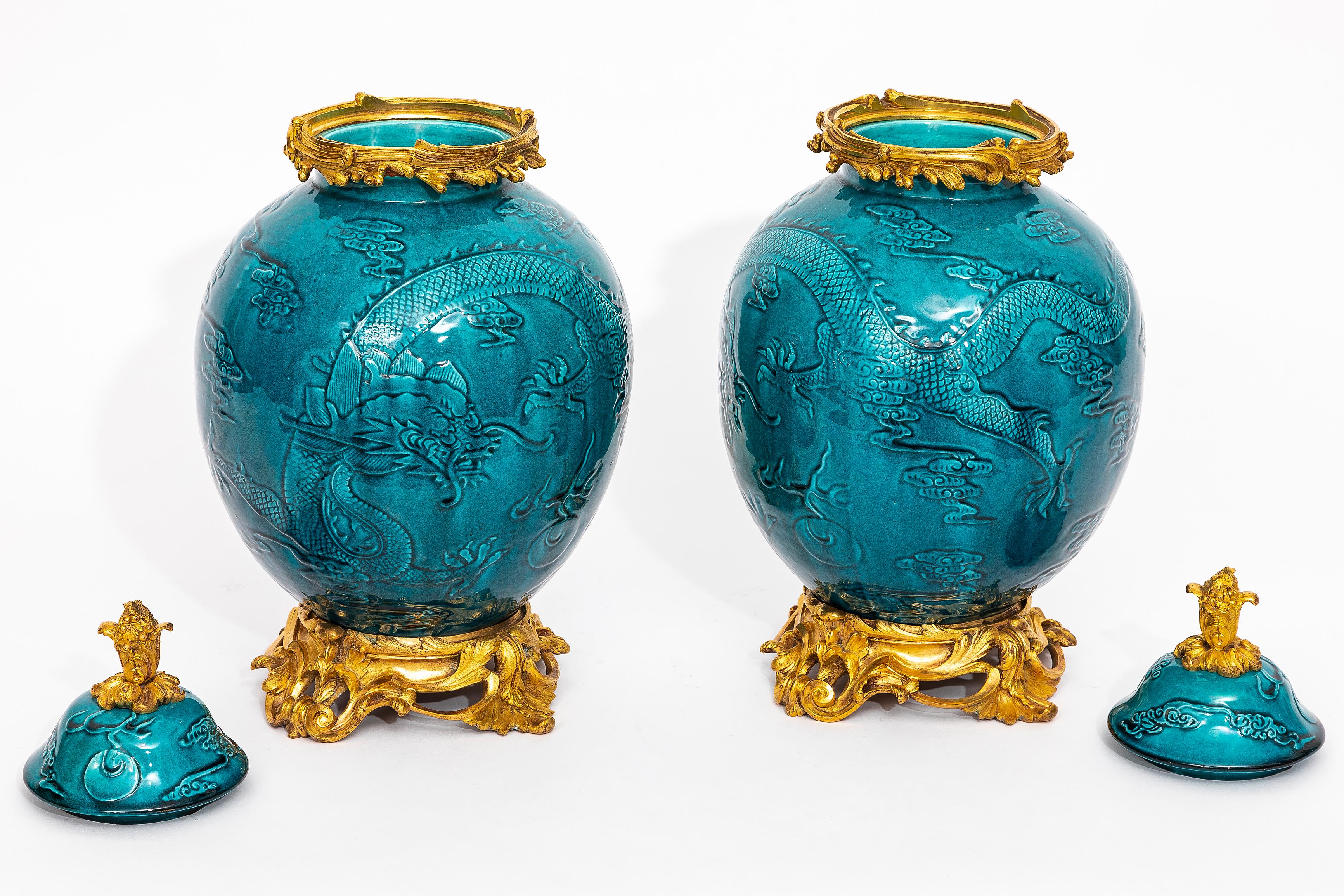 Hand-Crafted Pair of 19th Century Chinese Turquoise Porcelain Ormolu Mounted Covered Vases For Sale