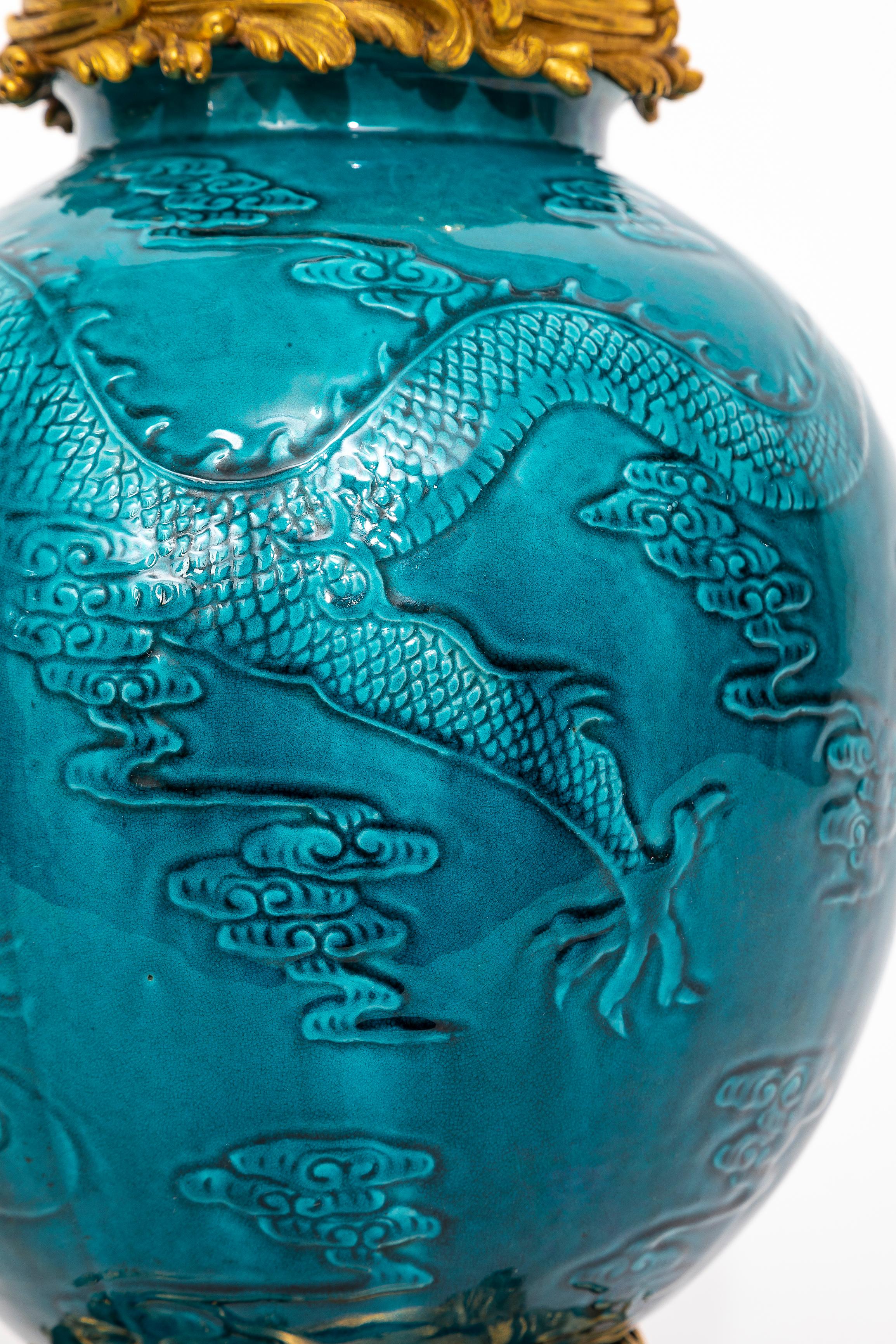 Late 19th Century Pair of 19th Century Chinese Turquoise Porcelain Ormolu Mounted Covered Vases For Sale