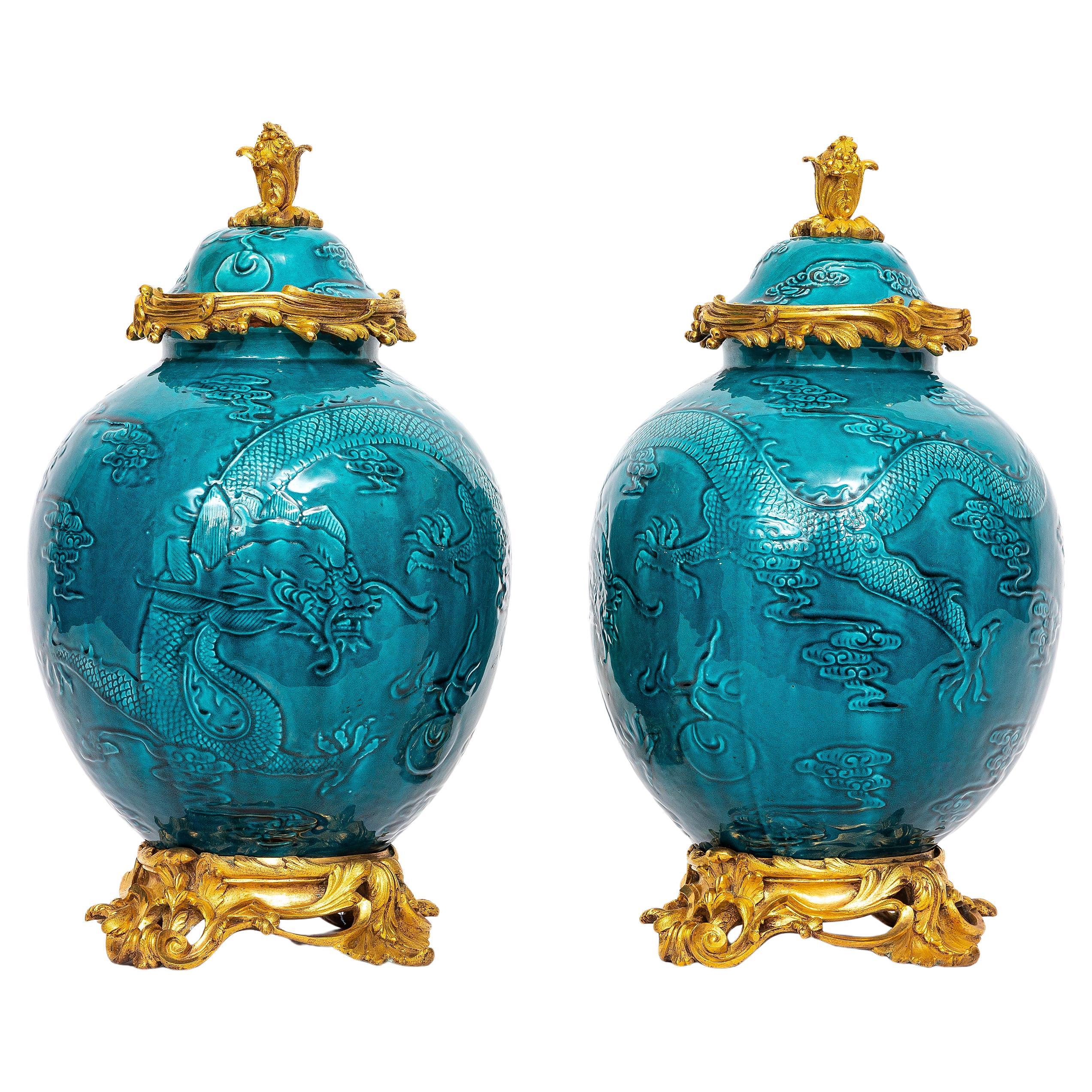 Pair of 19th Century Chinese Turquoise Porcelain Ormolu Mounted Covered Vases For Sale