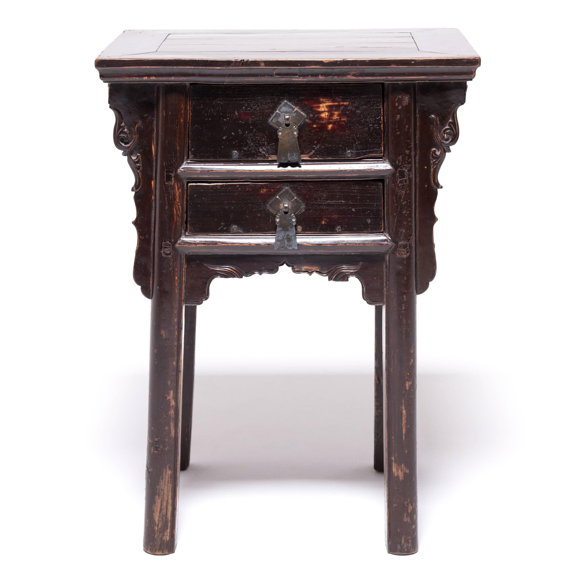 For over 150 years, through many turbulent years of Chinese history, this pair of petite cabinets has remained together. They are unusually configured with impressive original fittings, making them striking and collectible. Each was exquisitely