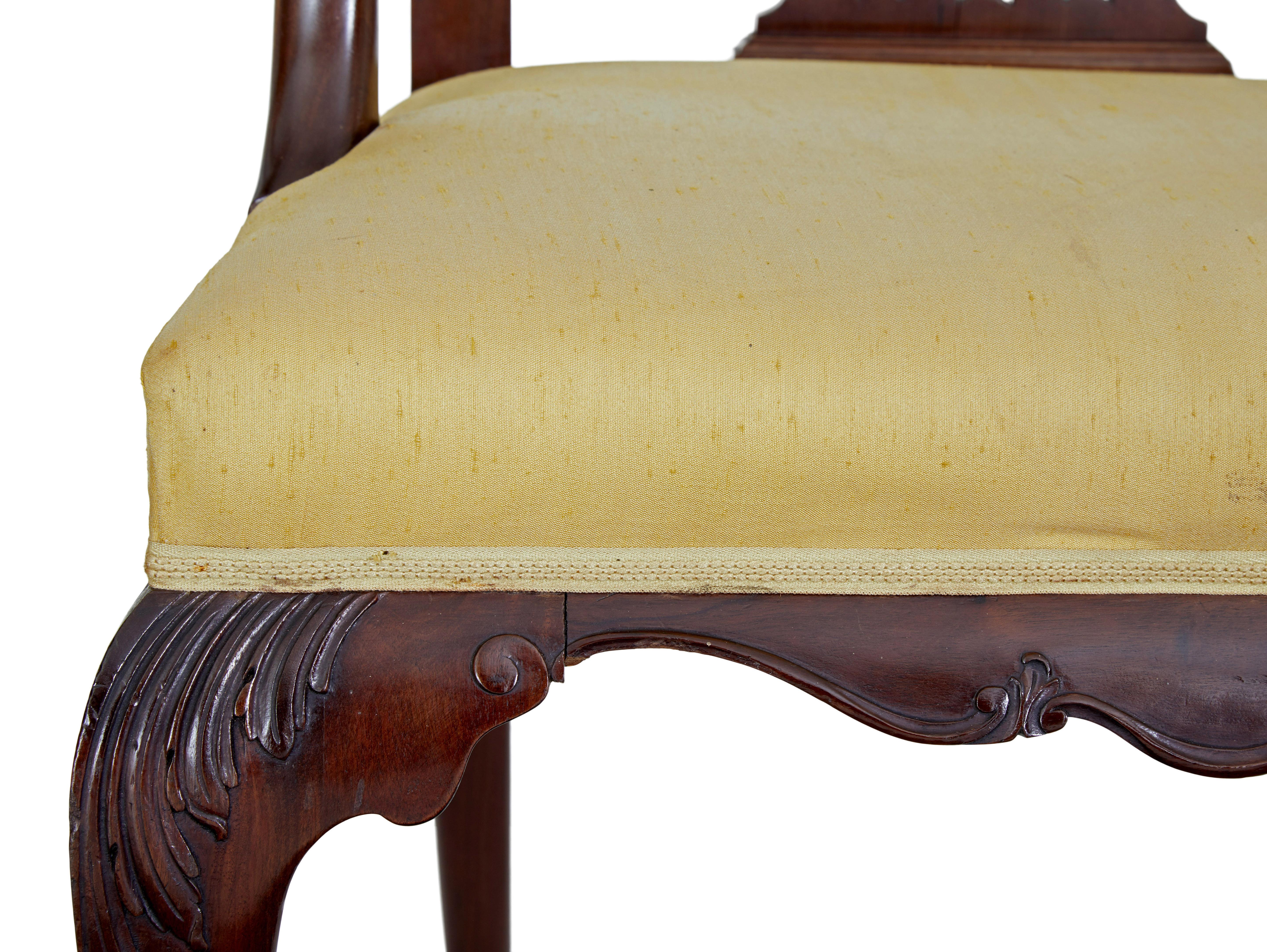 Pair of 19th century chippendale influenced mahogany armchairs circa 1890.

Elegant pair of mahogany armchairs strongly influenced by chippendale design,  shaped backs with carved scrolling arms with a shepherds crock finish. Acanthus leaf detail to