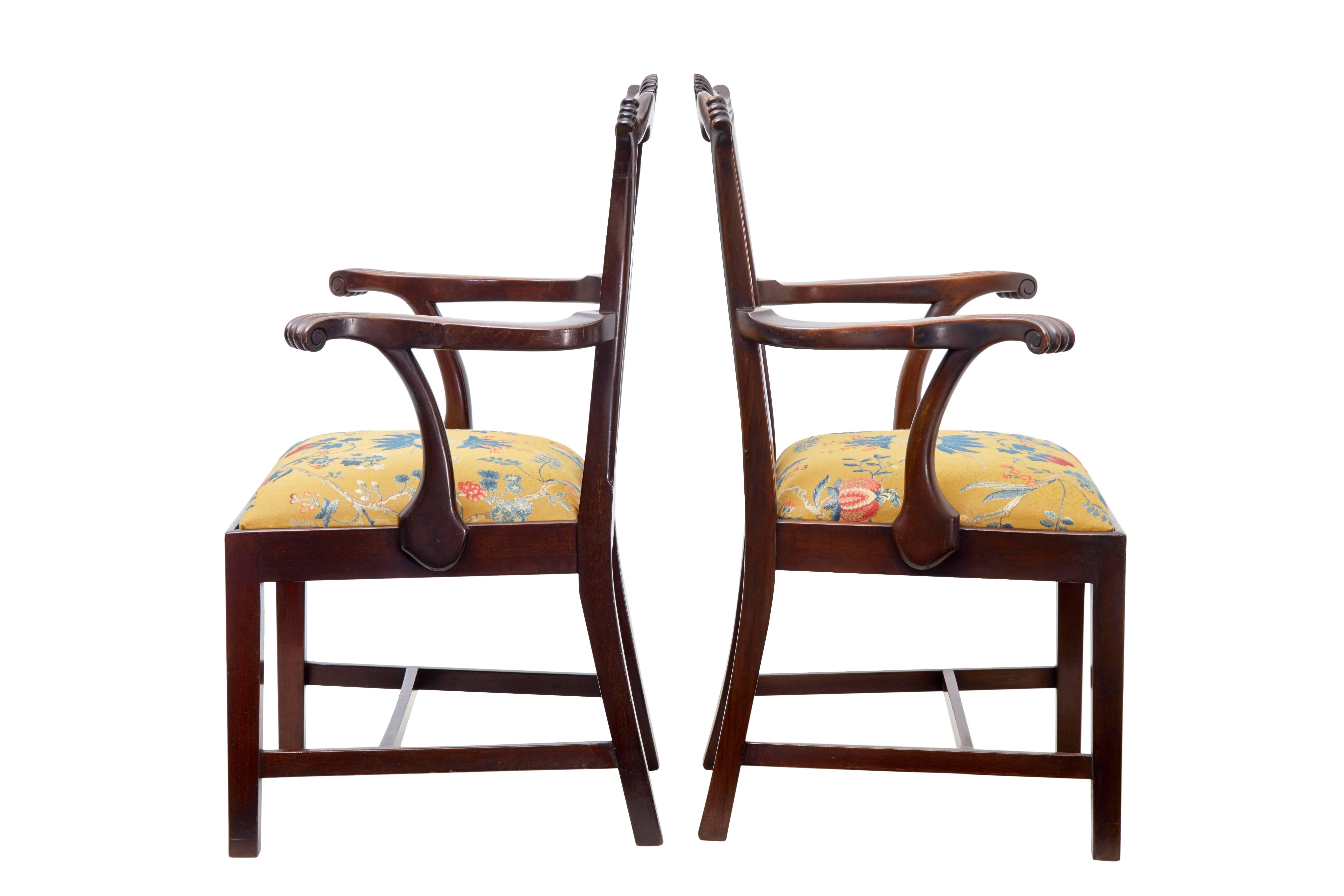 Fine pair of late 19th century armchairs in the Chippendale taste, circa 1880.
Beautifully carved backs and scrolled arms.
Drop in seats richly upholstered.
Straight legs united by stretcher.

Measures: Seat height 18 1/2