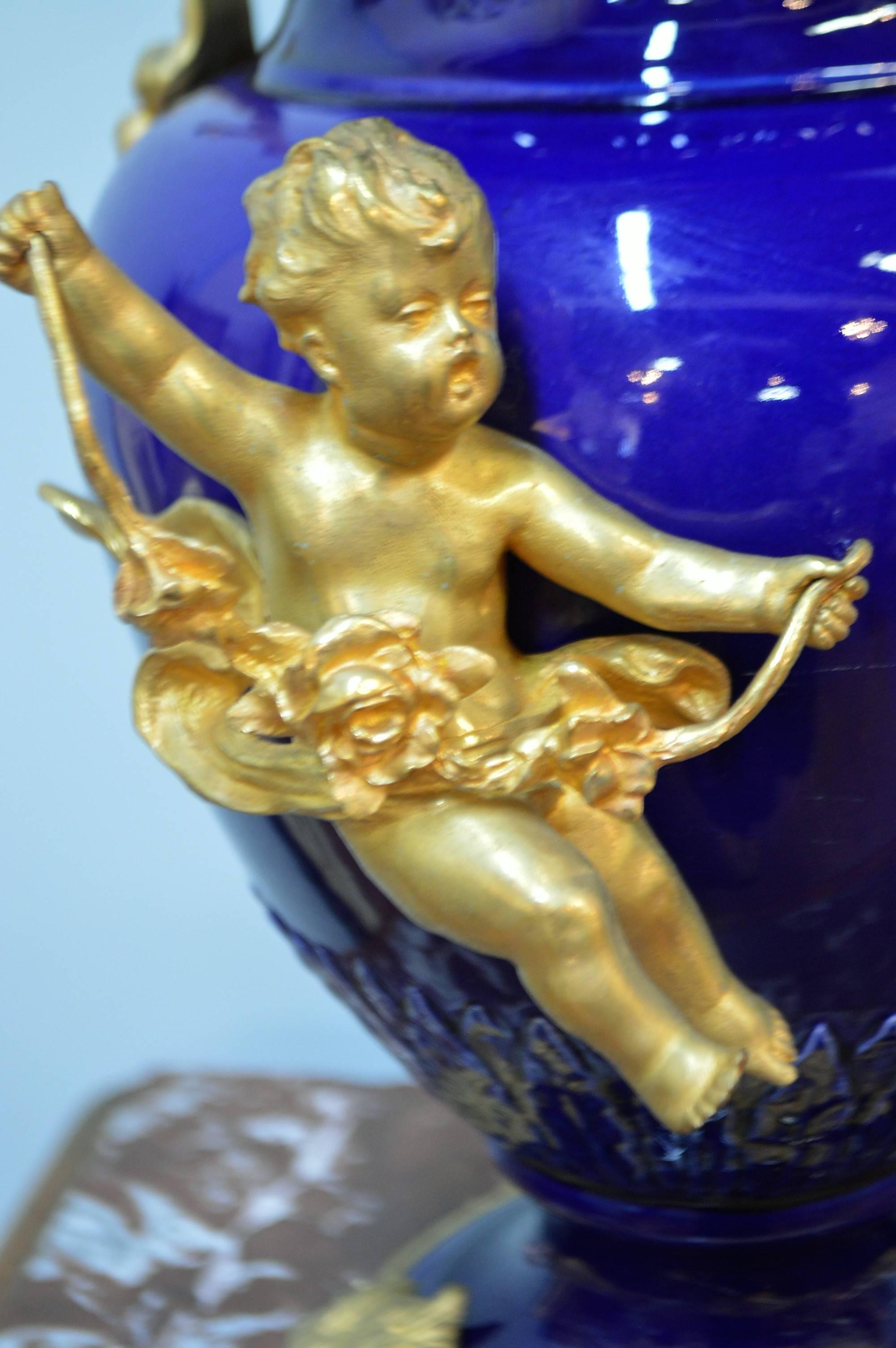 Pair of 19th Century Cobalt Blue Porcelain Urns with Fine Gilded Bronze Elements In Excellent Condition In Oakville, ON