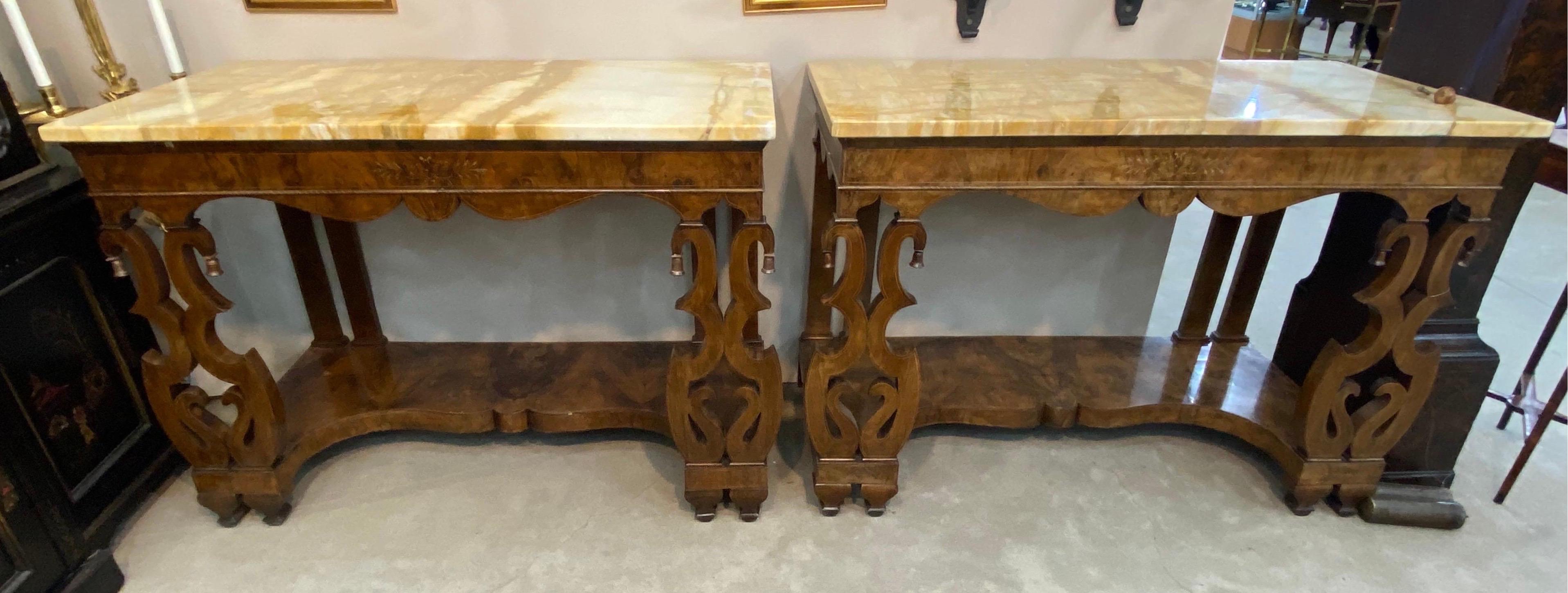 Incredible pair of 19th century Continental inlaid walnut consoles with yellow onyx tops. Northern Italian or Austrian mid 19th century. Incredible scale and quality