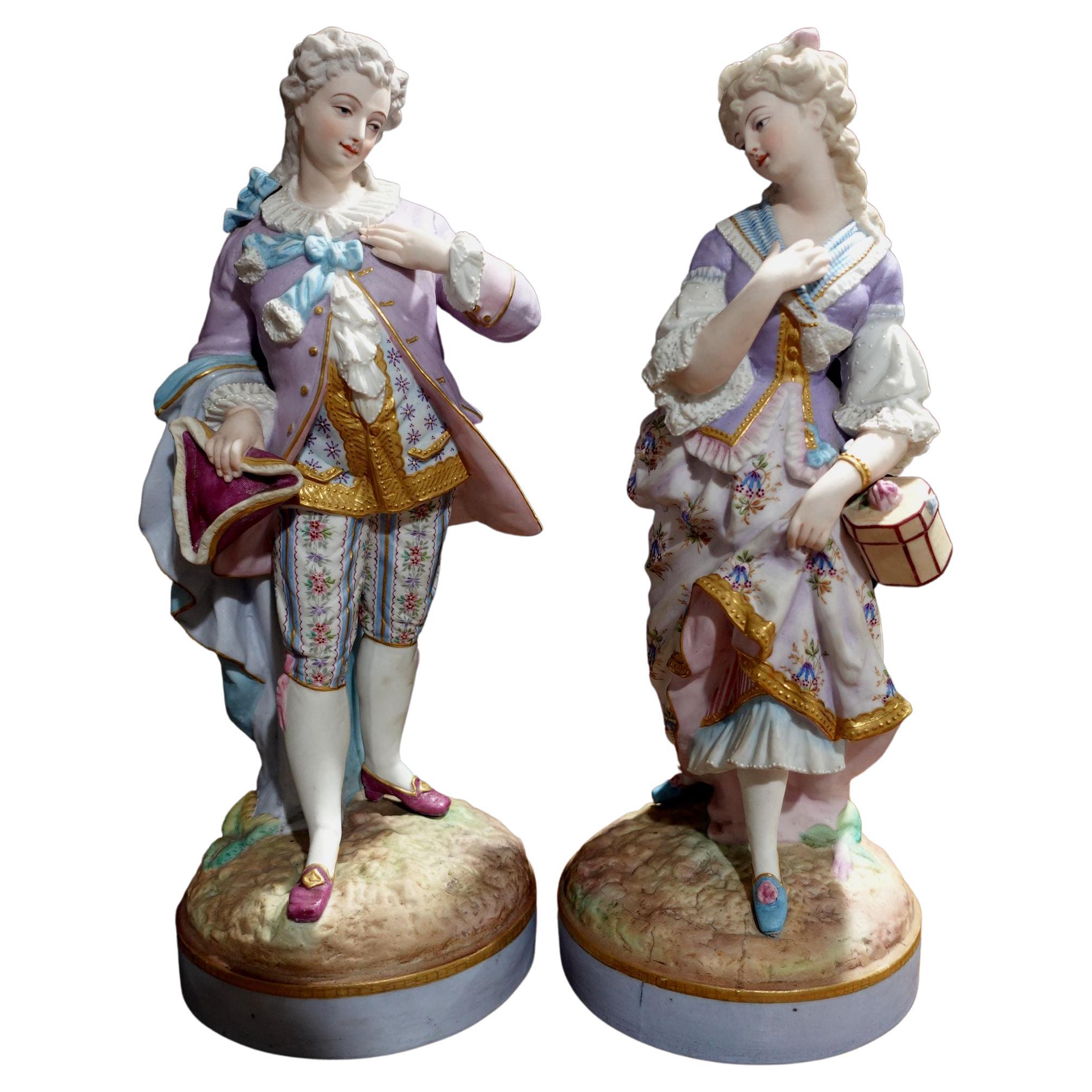 Pair of 19th Century Continental Porcelain Statues, Gentleman and Lady For Sale